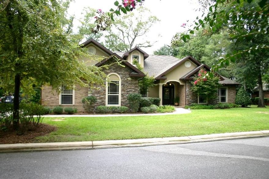 Fantastic, must-see home in Claire's Vineyard! If you want an open floor plan, hard wood floors, heated pool and amenities galore, this is the home for you! The kitchen features gorgeous granite counter-tops, custom cabinets, stainless steel appliances and a huge island. Perfect for entertaining since the family room, kitchen and dining room are all one large open space. Open the French doors to the Florida room then out to the pool and your guests will have a blast! All fixtures and appliances are all top quality and the home is move-in ready. This is a gated community so traffic is very minimal. There's plenty of parking with a 3 car garage and an over-sized driveway. Don't waste another minute! Call to see this beautiful home today!