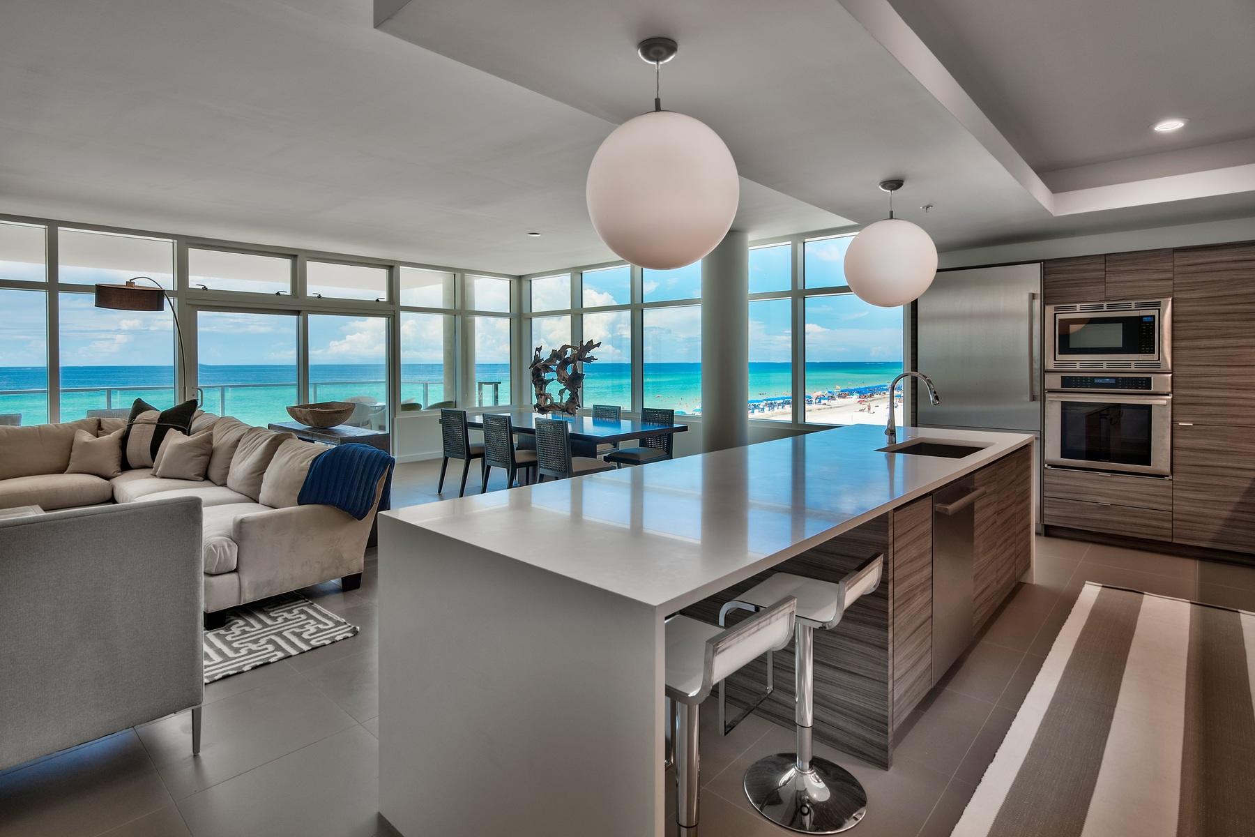 1900 Ninety Eight is Destin, Florida's first Gulf front condominium developed since 2007. Each exquisitely designed luxury residence features a panoramic view of the Gulf of Mexico from its private, 12-foot deep balcony equipped with an electric grill. The open plan with clean, flowing lines invites beams of natural light inside through an expansive wall of windows. Interior design elements that include custom cabinetry, marble and quartz countertops, Thermador kitchen appliances and porcelain stone floor tile makes this three bedroom, three bath residence truly incredible. Amenities include a rooftop pool, spa, fire pit & state of the art fitness center, along with gated entry, heated and cooled elevator and lobby areas and two levels of parking beneath the residences.