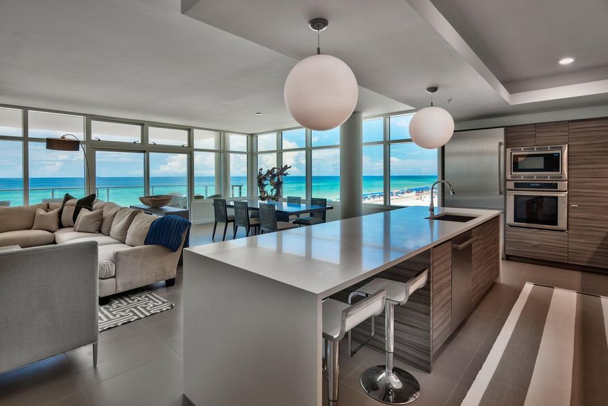 1900 Ninety Eight is Destin, Florida's first Gulf front condominium developed since 2007. Each exquisitely designed luxury residence features a panoramic view of the Gulf of Mexico from its private, 12-foot deep balcony equipped with an electric grill. The open plan with clean, flowing lines invites beams of natural light inside through an expansive wall of windows. Interior design elements that include custom cabinetry, marble and quartz countertops, Thermador kitchen appliances and porcelain stone floor tile makes this three bedroom, three bath residence truly incredible. Amenities include a rooftop pool, spa, fire pit & state of the art fitness center, along with gated entry, heated and cooled elevator and lobby areas and two levels of parking beneath the residences.