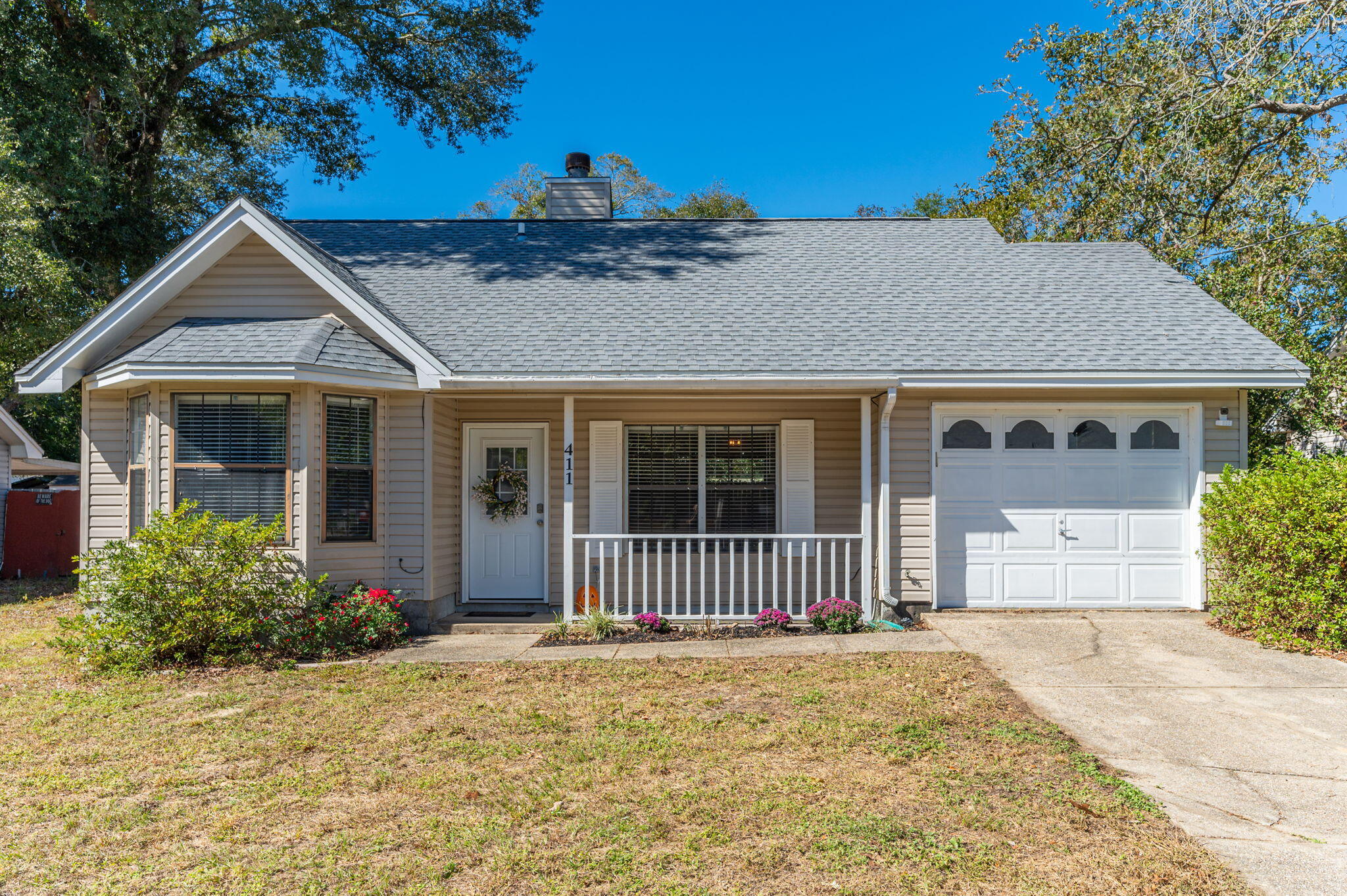 Welcome to this charming Florida cottage, perfectly blending modern updates with cozy charm. Step inside to discover beautiful renovated flooring and a spacious living room featuring a vaulted ceiling with an exposed wood beam, adding warmth and character. The fireplace offers a cozy centerpiece for gatherings.This home boasts several recent upgrades for peace of mind, including a new roof installed in 2022, a 2020 water heater, and a 2018 HVAC system. The fenced backyard provides privacy and a secure space for outdoor activities, while the security system and camera doorbell ensure you feel safe and protected.With a one-car garage for added convenience, this gem is ready for you to move in and enjoy all the best of Florida living.