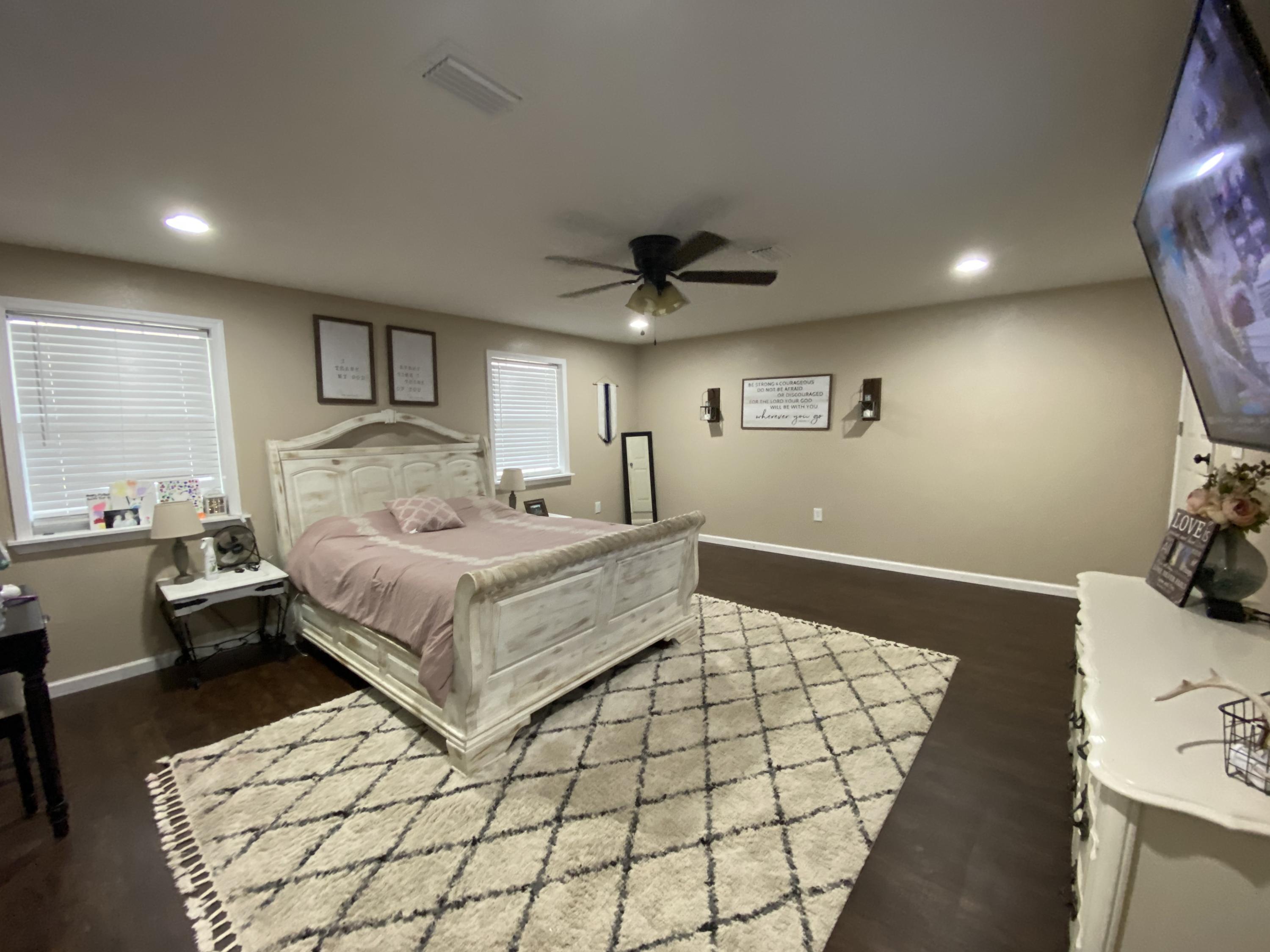 Check out this beautifully updated home in a quiet neighborhood! This home has 4 bedrooms with plenty of room to grow, including a detached barn/garage with plenty of space for storage! This house features an eat in kitchen with updated appliances and sliding glass doors that leads to the large, covered back porch. The master bedroom has a walk in closet, making plenty of room for your clothes, shoes and/or storage. Metal roof! Very close to restaurants, schools, and grocery stores. Additional land available. Come make this cozy home YOURS today!