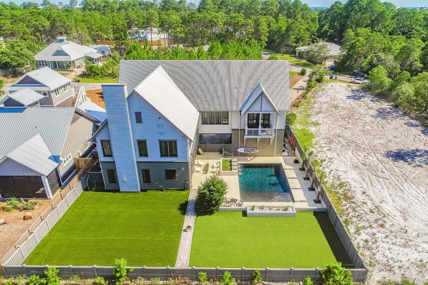 Custom designed luxury home located in the quiet part of Seacrest. This pristine home offers 4400 square feet of living space plus a resort styled pool that opens onto a large private fenced yard for pets to roam!