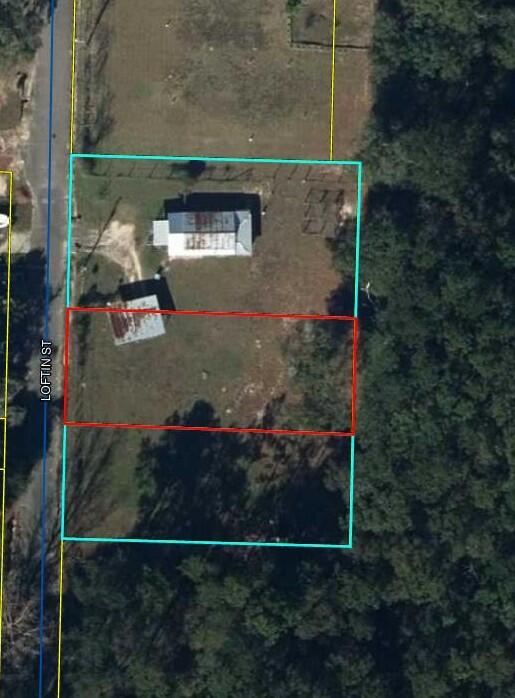 Great building lot inside the City of DeFuniak Springs. Level lot that has survey completed, parcel ID assigned and ready for the new owner. City utilities and power are not in place but readily accessible. The lot is fenced in the back. Two identical lots side by side, make a larger yard or build two homes.Don't let this one get away!