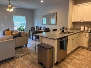 This 3 bedroom, 2.5 bathroom townhome was built in 2018 and boasts granite countertops, stainless-steel appliances, EVP flooring throughout the 1st floor with carpet in all the bedrooms upstairs. There is a private fenced in deck/patio in back of the unit overlooking a community water feature. The townhome is 1 minute from HWY 98 and approximately 10 minutes from the beaches and close to 30A. The unit is within walking distance of Padgett Park (playground, splash pad), nature trails, public Library, and Alaqua Dog Park. Yard maintenance is included.