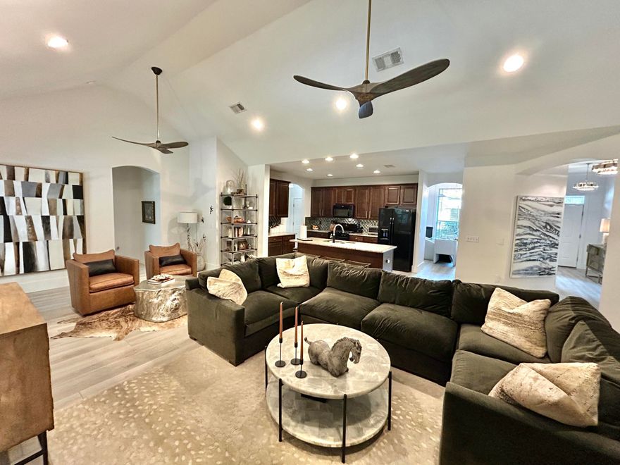 Better-Than-New, Lovingly remodeled by a Builder & an Interior Designer. Top to bottom redo w/ Quality finishes, flooring, paint, custom closets; Designer Level lighting, fans, hardware & so much more! Light & Bright, Spacious & Comfortable, Stylish and Livable. High Ceilings, Open/Split Bedroom Floor plan, Gourmet Kitchen, Gas Fireplace, Screened Porch. HUGE Fully Fenced backyard w/ Fruit trees, backs to Green Space. Sits on a 1/4 acre lot in Bay Cove w/ its Established Community of well-kept homes, Mature Trees on a Cul-de-sac. Hammock Bay Amenities... Tropical Pool, Tennis, Pickleball, Gym, Playground, Dog Park, Movie Theater, Boat/RV parking, Great School System. The Sports Complex, Marina/Boat Launch.You owe it to yourself to see this home! Check out Pics & Upgrades List.