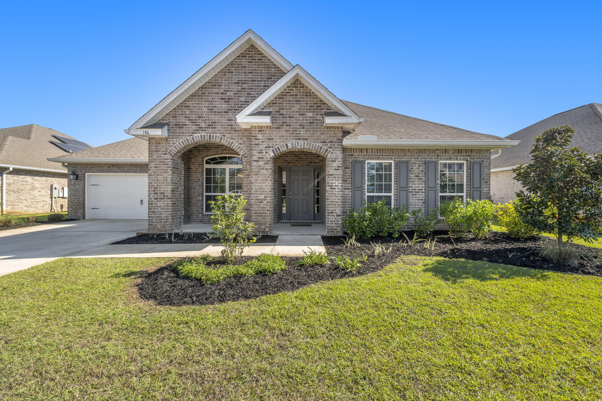 Nestled within the serene enclave of Peach Creek, 146 Wayne Trail epitomizes the epitome of luxury coastal living. Step into a world where elegance meets comfort, where every corner of this magnificent abode tells a tale of sophistication and tranquility.This stunning residence boasts the coveted McKenzie floorplan, a testament to thoughtful design and superior craftsmanship. With 3084 square feet of indoor living space, this home offers ample room for both relaxation and entertainment, making it an ideal haven for families and discerning individuals alike.As you step through the entryway, be greeted by an abundance of natural light cascading through the expansive windows, illuminating the exquisite finishes and impeccable attention to detail throughout. From the opulent chef's kitchen, adorned with top-of-the-line appliances and custom cabinetry, to the inviting living spaces, perfect for intimate gatherings or lavish soirees, every element of this home exudes luxury and refinement.
Step outside and find yourself in the spacious backyard, a welcoming refuge where you can enjoy both recreation and relaxation. The sprawling covered patio is sure to become a favorite and frequent retreat for a cold beverage, a catnap, or simply for the quiet enjoyment of the outdoors.
Beyond the confines of this extraordinary residence lies the unparalleled beauty of the surrounding area. Situated just moments away from the pristine beaches of 30A, residents of Peach Creek enjoy easy access to some of the most breathtaking stretches of coastline in the world. Whether it's lounging in the sun, swimming in the azure waters, or indulging in world-class dining and shopping, the possibilities for adventure and relaxation are endless.
For those with a passion for boating and water sports, the proximity to Choctawhatchee Bay and the Intracoastal Waterway presents an unparalleled opportunity to explore the wonders of the Gulf Coast from a unique perspective. Spend your days sailing along tranquil waters, fishing for the catch of the day, or simply basking in the beauty of the natural surroundings.
In addition to its idyllic location, Peach Creek evokes an affinity for nature and the outdoors that enhances the quality of life for its residents. From thoughtfully curated grounds and extensive sidewalks, to a proximity to multiple state parks, walking trails and lush green spaces, the neighborhood lends itself to a lifestyle prioritizing activity, relaxation, and wellness.
Don't miss your chance to experience the epitome of luxury coastal living at 146 Wayne Trail. Schedule your private tour today and discover why this exceptional residence is the perfect place to call home.