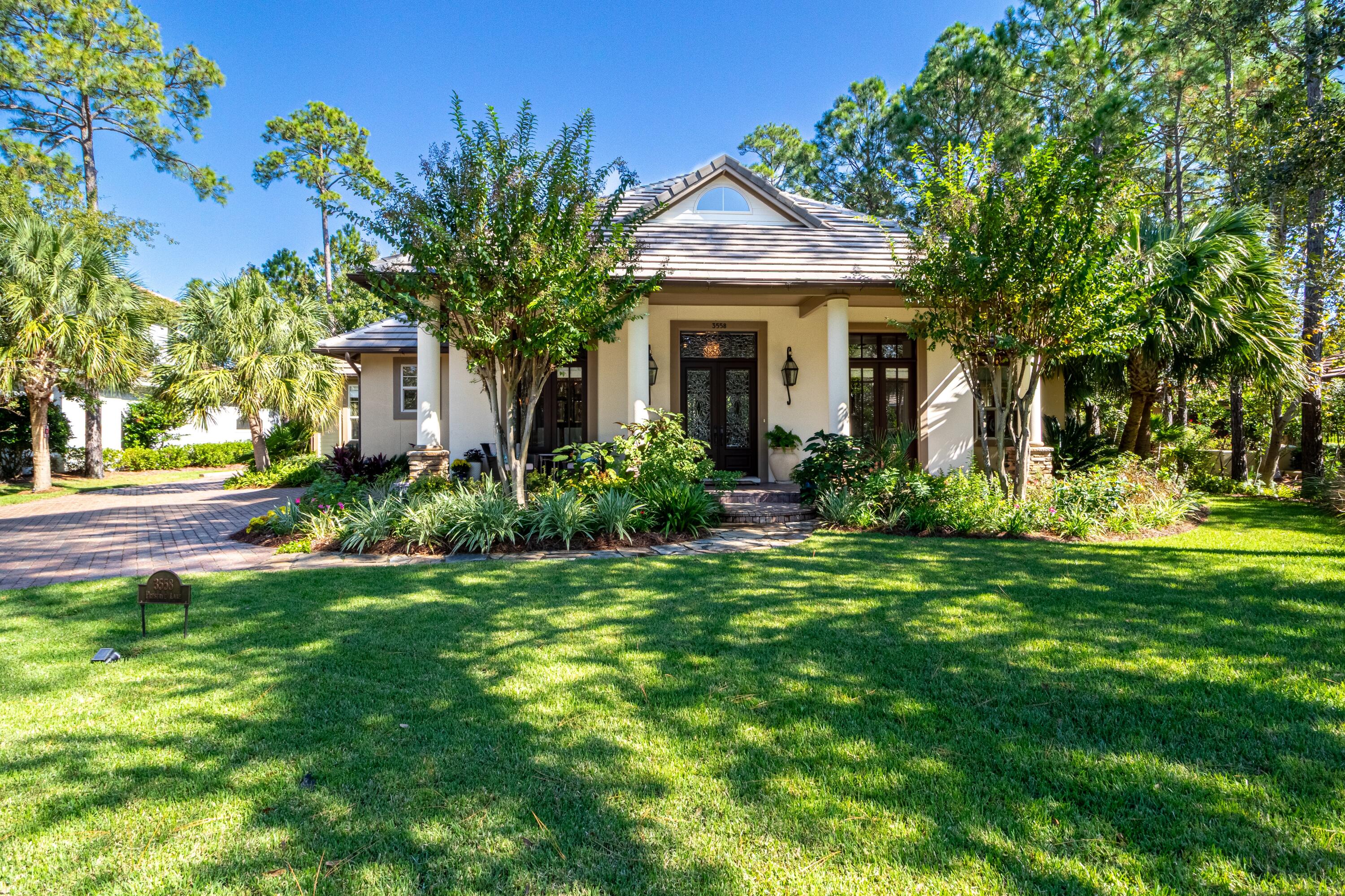 Tucked away in the exclusive Preserve neighborhood within Burnt Pine at Sandestin Golf & Beach Resort, 3558 Preserve Lane offers refined, single-level living with exceptional indoor and outdoor spaces. Soaring 25-foot ceilings in the great room create an airy, grand feel, while the newly painted interior and all-new flooring--including rich hardwoods throughout the main living areas--bring a fresh, elegant touch.The main home flows seamlessly into the backyard oasis, featuring a private pool, an outdoor kitchen, and plenty of covered space for relaxing or entertaining. Perfect for guests or extended family, the spacious one-bedroom carriage house sits above a 2.5-car garage (room for two vehicles plus a golf cart) and includes its own full kitchen and living room. With two brand-new HVAC systems in the main house and an unbeatable location just around the corner from the private Burnt Pine Golf Club, this home blends comfort, quality, and convenience in one of the most sought-after enclaves in Sandestin.
As an introduction to the Sandestin lifestyle, we invite our new owners to explore amenities that make Sandestin special. The listing brokerage and seller(s) are presenting the buyer(s) of this property with (2) 90-minute rounds of Tennis court time, a golf foursome at one of our three championship courses, and a round of golf for up to four (4) players at the unrivaled Burnt Pine Golf Club.
Sandestin Golf and Beach Resort features more than seven miles of beaches and pristine bay front, four championship golf courses, 15 world-class tennis courts, a 226-slip marina, a fitness center, spa and celebrity chef dining. Shop, dine and play at the charming pedestrian village, The Village of Baytowne Wharf and more. Inside the gates of the resort, residents enjoy a balanced lifestyle of high-class living, spanning the 2,400 acres from the beach to the bay. Everything within the gates of the resort is accessible by golf cart or bicycle. The entire resort is interconnected by miles of pedestrian, bike and golf cart paths that weave through groves of live oaks, meandering past natural lagoons, fountains, man-made lakes, and meticulously landscaped fairways.