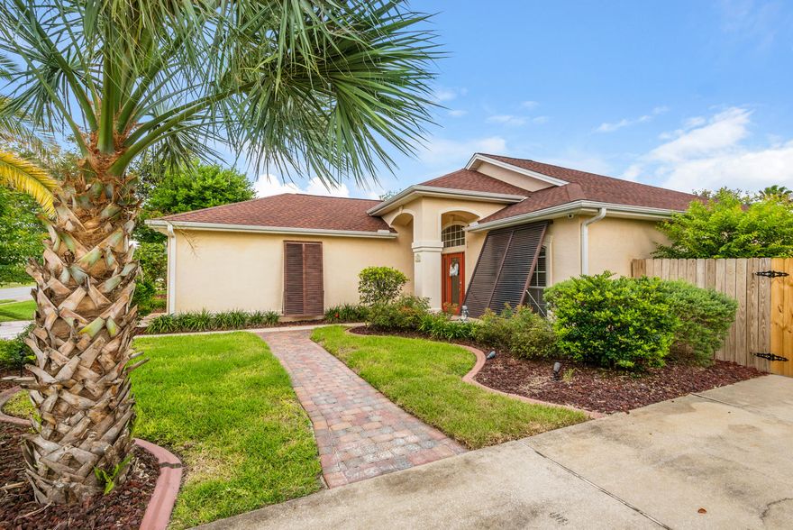 This beautiful home is located on a corner lot with two driveways in one of the best subdivisions on the beach! Easy access to the beach, shopping, Hwy 79 and Hwy 98. Seller has updated both bathrooms and many other areas of the home, This home is a perfect residence or second home. The property also has a two car garage with wooden ceiling, ample driveway parking and a private area for parking your motorhome.With grapefruit and orange trees in the yard, you'll truly feel as if you've 'arrived' in Florida! New roof/2014, carpet, water softener system, high tech water heater, irrigation system, landscape lighting and more have been installed.Enjoy the outdoors with a gas fire pit and seating area for entertaining! Call for details! This beauty won't last long! Buyer to verify