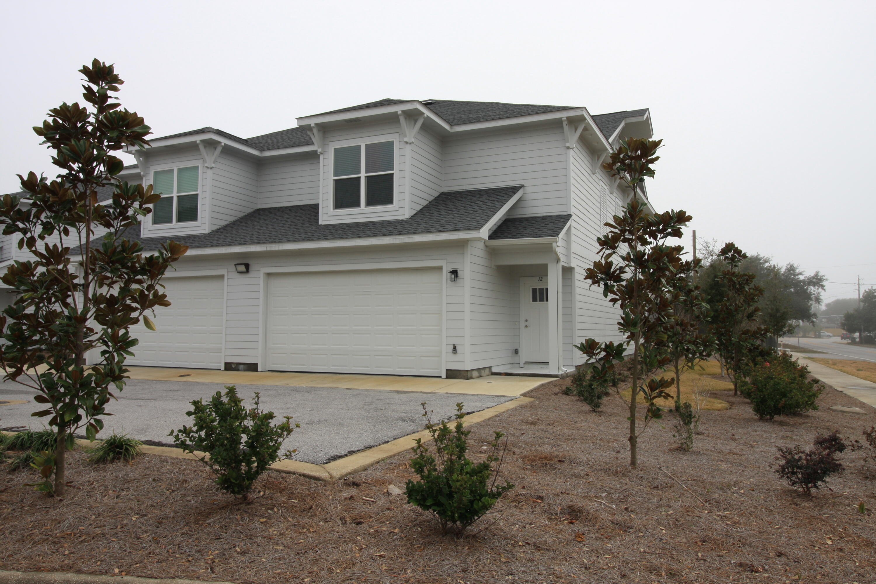 ***Available IMMEDIATELY*** This brand new 3 bedroom / 2.5 bath townhouse is located in the middle of Destin where you can walk to harbor! We will consider small pets, with extra deposit. The 2 car garage and dead end private road offers plenty of parking. Out back is a covered patio with an outdoor shower and lovely landscaping that the HOA takes care of!! The community pool is offset to the left - steps away, but far enough that you don't hear the pool noise! Only 12 units in the complex in a very safe neighborhood, close to Destin Elementary. We are looking for a 1 year lease. Call for a showing.
