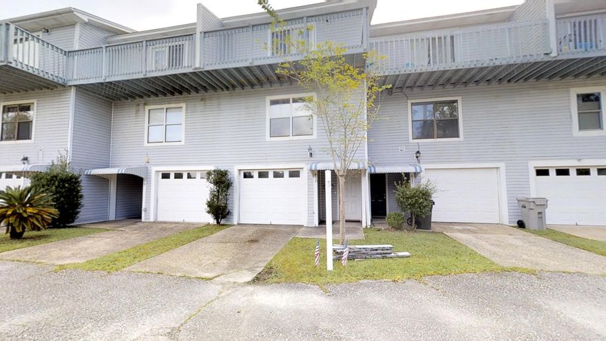 There's lots to be excited about in this 3 story Townhouse on a private street right near the water. This three bedroom, three full bath home is ready for your vision to bring it to its full potential. On the ground floor you'll find a single garage door with parking for 2 cars, and generous storage areas. Upstairs is the main living area, kitchen with granite countertops and a large screened deck just to start. One bedroom and a full bath are on the main level. You will find the master bedroom with its own balcony, bathroom with double sinks upstairs as well as an additional bedroom and bath along with the laundry room. Come take a look...you'll get lots of house for the price on this one!