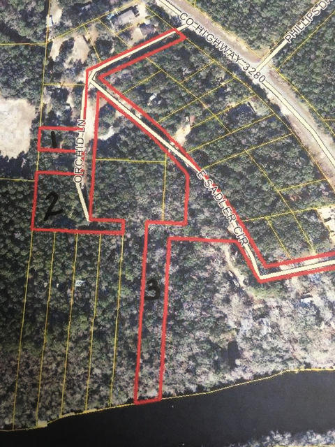 This is a water front parcel located on the Black Creek river with access to the bay by boat.! Located behind the Outpost, this parcel is tucked away on deep water and would make a great home site or a wonderful get away'' property to go on the weekend and relax, boat and fish.