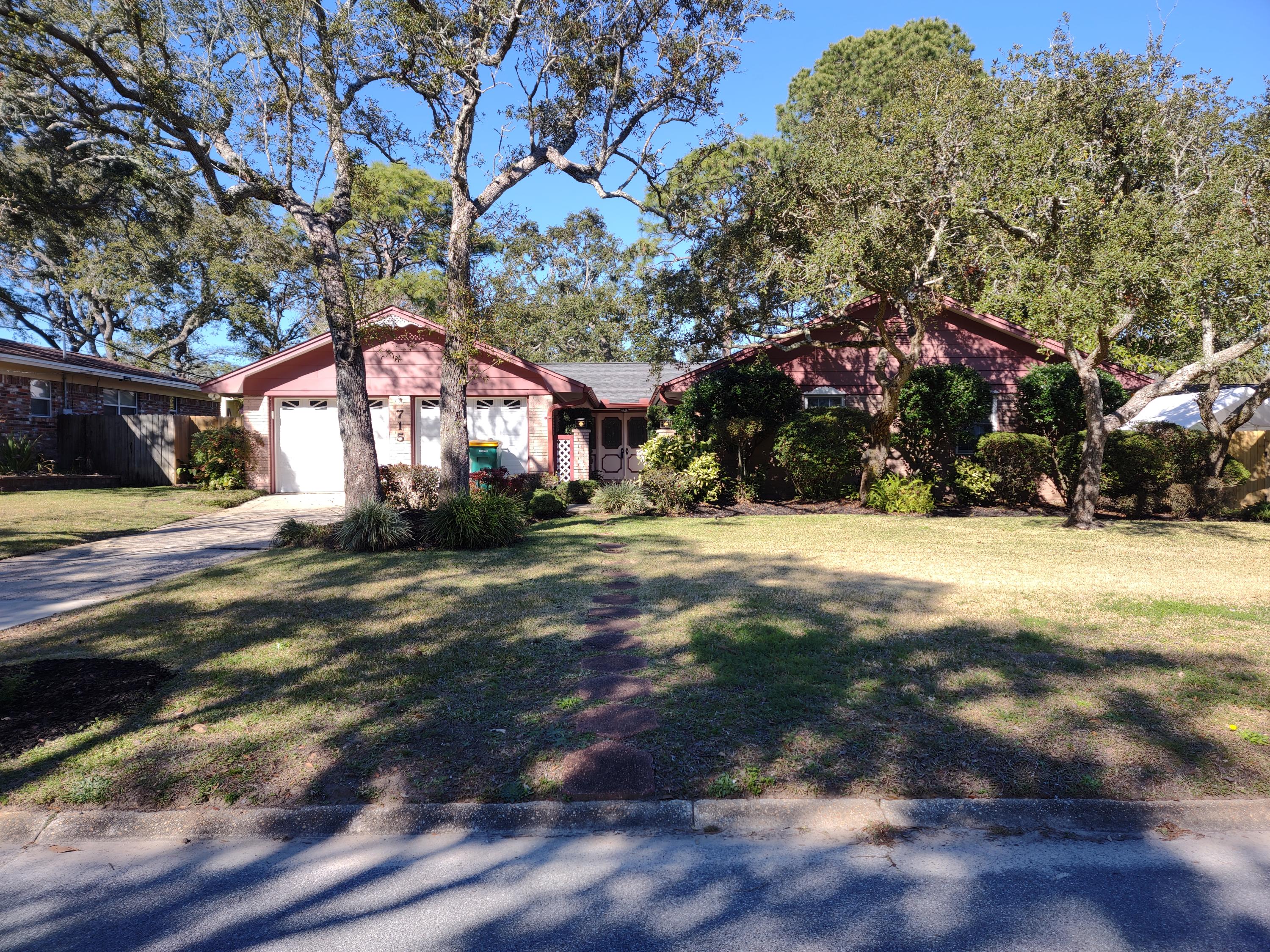This spacious home has two separate living areas. The spacious family room has a bar connection with the kitchen, a custom fireplace for one focal pint and two sliding French style doors opening to the pool area. This room also has custom ceiling beams to give some architectural interest. In addition to informal areas there is a formal dining room. The kitchen appliances have been updated and are new including the Kitchen Aide refrigerator. There two master bedroom areas with walk-in closets and baths. Two more bedrooms and a third bathroom round out the bedrooms. One bedroom features built in bookshelves. The HVAC has been updated. The landscaping is nicely done. There is a poolside gazebo. There is also a green house/workshop as needed. There are multiple storage opportunities