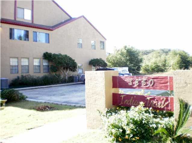 Large one bedroom condo with a vaulted ceiling. Freshly painted and updated - move in ready. This second story condo has a large living room plus a dining room with a mirrored wall. Brand new stove & microwave in the compact kitchen that has a breakfast bar opening onto the dining room. Both the living room and the bedroom have sliding doors that open onto the Florida room. The Florida room is completely enclosed and surround by windows that you can open to catch the breeze. There is a walk in closet in the bedroom. A stacking washer and dryer are included with this unit. There are plenty of parking spaces, none are assigned. There is an in ground pool and well kept landscaping.