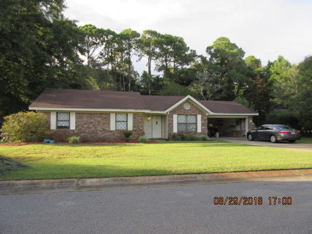 A 3 bedroom 2 bath home backing up to the Eglin Reservation located in the heart of Ft Walton Beach. All brick. The home offers a charming kitchen that has newer cabinets, countertops, and tile floors. the kitchen is situated between the breakfast nook that is light and bright from the windows and the dining room on the front of the home. The great room has tiled floors, wood burning fireplace with mantel and hearth. The great room leads to a large patio that overlooks the gorgeous back yard. 1 small pet under 20 pounds accepted with prior owner approval and a non-refundable pet fee. No aggressive breeds. No smoking. Showings by appointment only. Cannot be shown prior Christmas and tenant must have 24 hr. notice.
