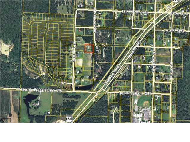Bank Owned ~ .94 acres single family lot in Laurel Hill. This lot is level and accessed off of 7th Street.
