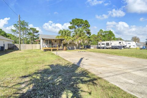 Photo of 9276 Ridge Drive, Navarre, FL 32566 (MLS # 988416)
