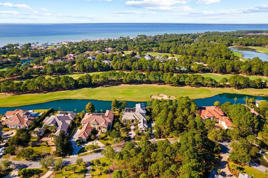This spectacular estate is located in the exclusive community of Burnt Pine in the Sandestin Golf and Beach Resort. Enjoy your stunning lake and golf course views in this meticulously maintained home. A well-planned layout provides everything you need for daily living on the main level and includes a three-car garage and additional golf cart garage. This home has an amazing second-level screened patio, bonus entertaining room and bedroom suite perfect for extended family or guests complete with private elevator. The master suite takes up the left wing of the home and is complete with his/her walk-in closets, separate shower and tub and a cozy sitting room off the bedroom. The main level has an office, formal dining room, living room with fireplace and a family room off the open kitchen.