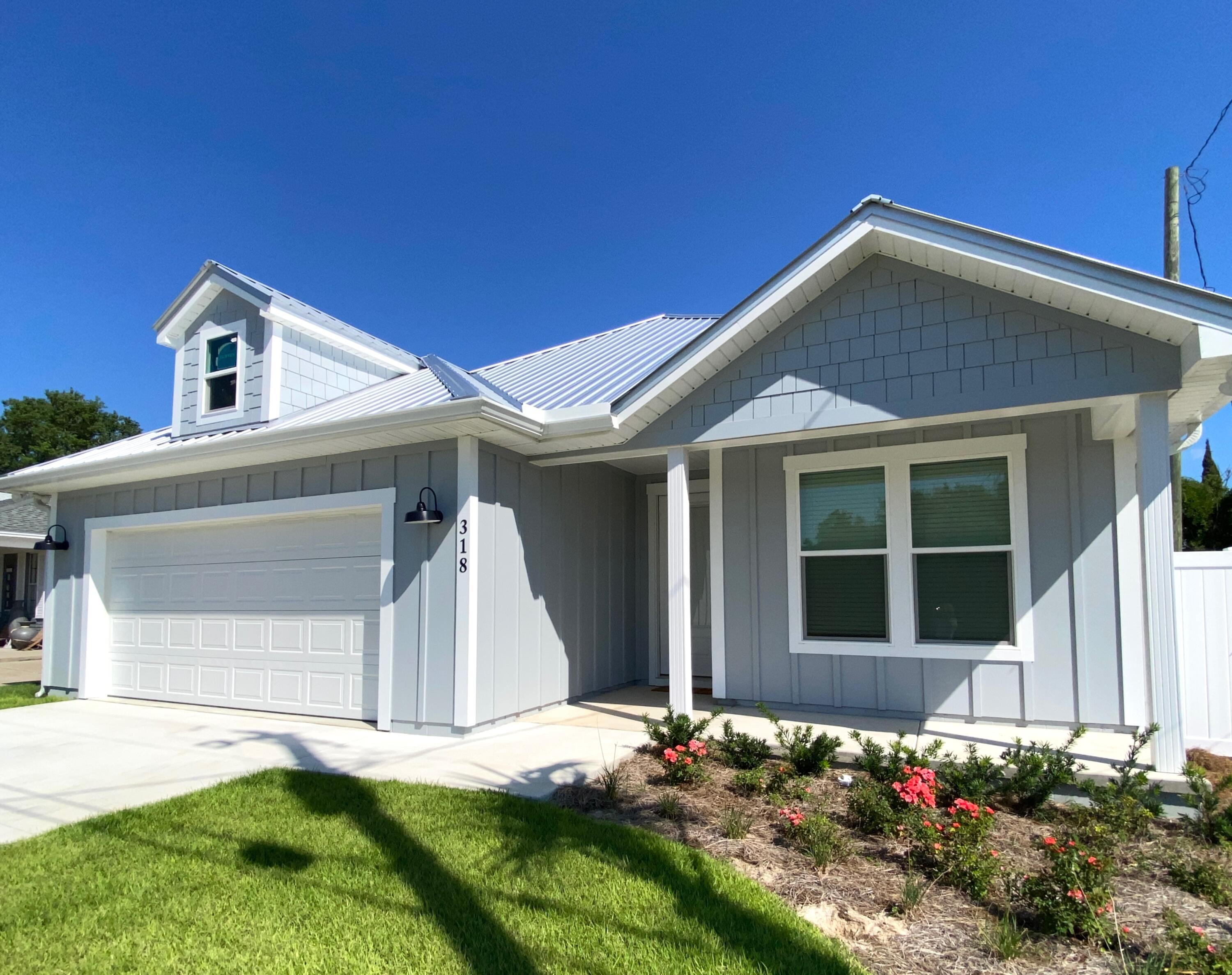 BEST PRICE ON NEW CONSTRUCTION in Laguna Beach! 3 Blocks from the gorgeous Gulf of Mexico. Laguna beach sits on the west end of Panama City Beach, offering dedicated beaches, and amazing investment potential! Short term rental projections up to $85K. Home is also the perfect floor plan for a full time residence. Privacy fence surrounds the large back yard with room for a pool, if desired. Lots of living space inside & out. Covered patios, 8' triple sliding glass doors blend indoor living w/oversized patio & yard, creating an open concept that beautifully ties together indoor & outdoor spaces. Public sewer & water. Pool quote & sketch available. Chef's kitchen, upgraded appliances, 10'-12' ceilings, 8' doors, high end LVP flooring, huge master suite & bath, walk-in closets, pantry &