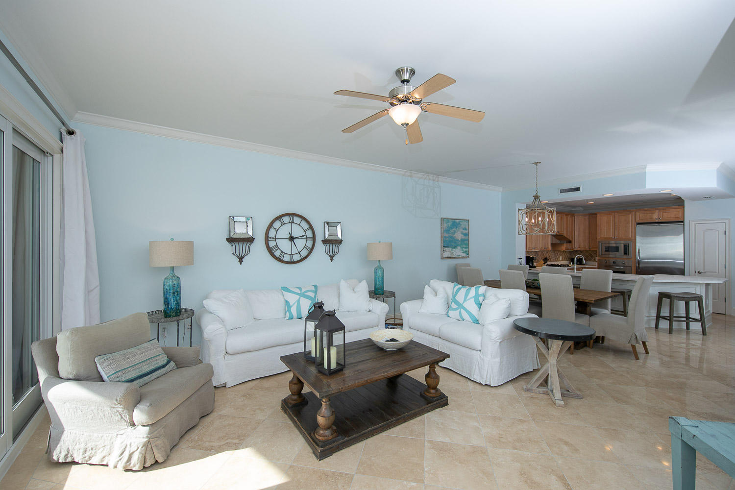 NEW REMODELED KITCHEN WITH NEWLY POLISHED TRAVERINE FLOORS. A motivated seller wants an offer on this 4 bedroom/ bunk room Gulf front condo. A large Gulf front balcony with spectacular open panoramic east and west views. The building is concrete construction with under building parking/storage cage for security and convivence. . This building is built to be here forever. There are High end finishes with Viking appliances with travertine tile in the living and bathroom areas. There is a large laundry room and there is also another room which can be used as a tv room, or even an extra sleeping area. The 10 foot ceiling make this condominium look and feel very spacious. Adagio has one of the largest pools in the area. The complex is gated for added security. Bring us an offer.