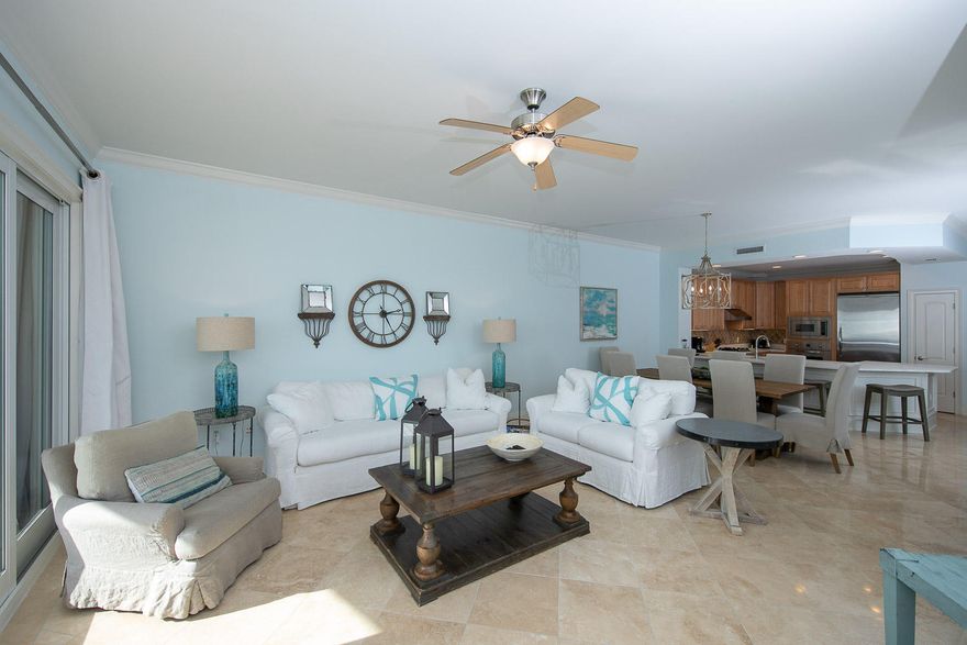 NEW REMODELED KITCHEN WITH NEWLY POLISHED TRAVERINE FLOORS. A motivated seller wants an offer on this 4 bedroom/ bunk room Gulf front condo. A large Gulf front balcony with spectacular open panoramic east and west views. The building is concrete construction with under building parking/storage cage for security and convivence. . This building is built to be here forever. There are High end finishes with Viking appliances with travertine tile in the living and bathroom areas. There is a large laundry room and there is also another room which can be used as a tv room, or even an extra sleeping area. The 10 foot ceiling make this condominium look and feel very spacious. Adagio has one of the largest pools in the area. The complex is gated for added security. Bring us an offer.