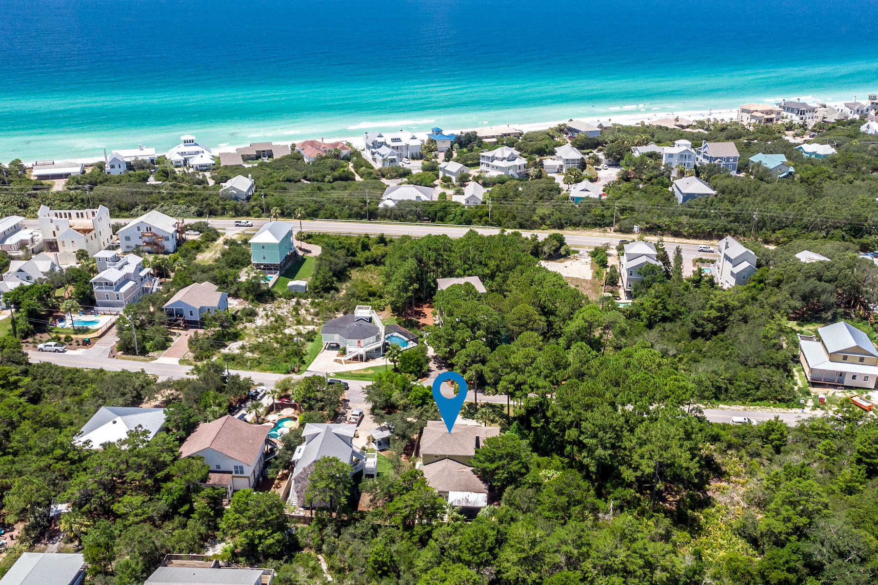 Major Price Improvement-Great Deal. Beach Highlands neighborhood just off 30A a short walking distance to multiple beach access points and public beaches.  Terrific well maintained home on nice, landscaped lot.   Custom built  w open floor plan -10 ft  first floor ceilings -comfortably flowing between kitchen, dining and great room areas.  Floor plan boasts a master suite and guest bedroom on the first level, both with zero entry showers.  Large side screen porch area off dining room and rear screen porch overlooking low maintenance back yard with dog turf, pavers and hot tub.  Two guest bedrooms and a study area complete the second floor.  Two car garage and spacious parking make this home very livable. Conveniently located near Gulf Place and Santa Rosa Golf Beach Club and 30A bike path