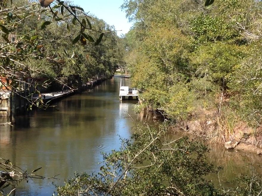 Waterfront!!! Canal front lot. Dock your boat in the back yard for access to Buck Bayou and Choctawhatchee Bay. Build your new home on the canal. Property comes with engineered house plans. Minutes from Grand Boulevard, Sacred Heart Hospital, and the Driftwood park.