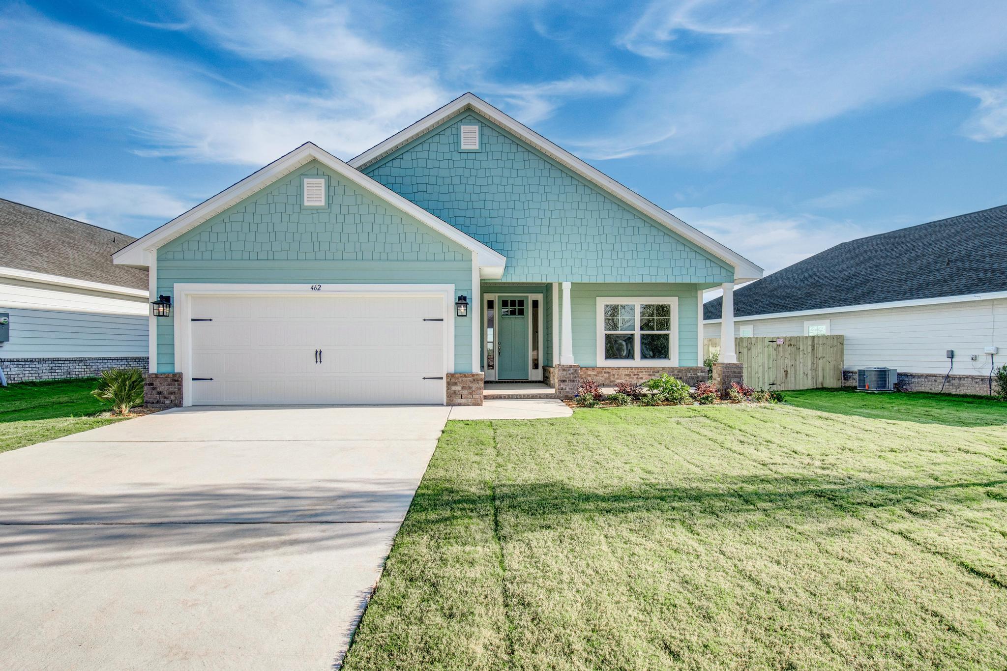Builder pays most closing costs when a preferred lender is used. In addition, this home is eligible for 4.99% fixed rate FHA or VA loan, + up to $10k in flex money to use for buyer's choice of builder options, prepaids or remaining closing costs. THE BLUFFS is a new Freeport subdivision located just a 20 minute drive to South Walton beaches! Craftsman style, full brick, 4 BR/2 BA home with Hardiboard siding and. The interior features a cathedral ceiling in the main living area, 9' ceilings on other rooms and a 10' trey ceilings in the Master Bedroom. 8' entry doors, quartz countertops and durable CoreTec Pro Plus luxury vinyl plank flooring throughout. Covered patio out back!