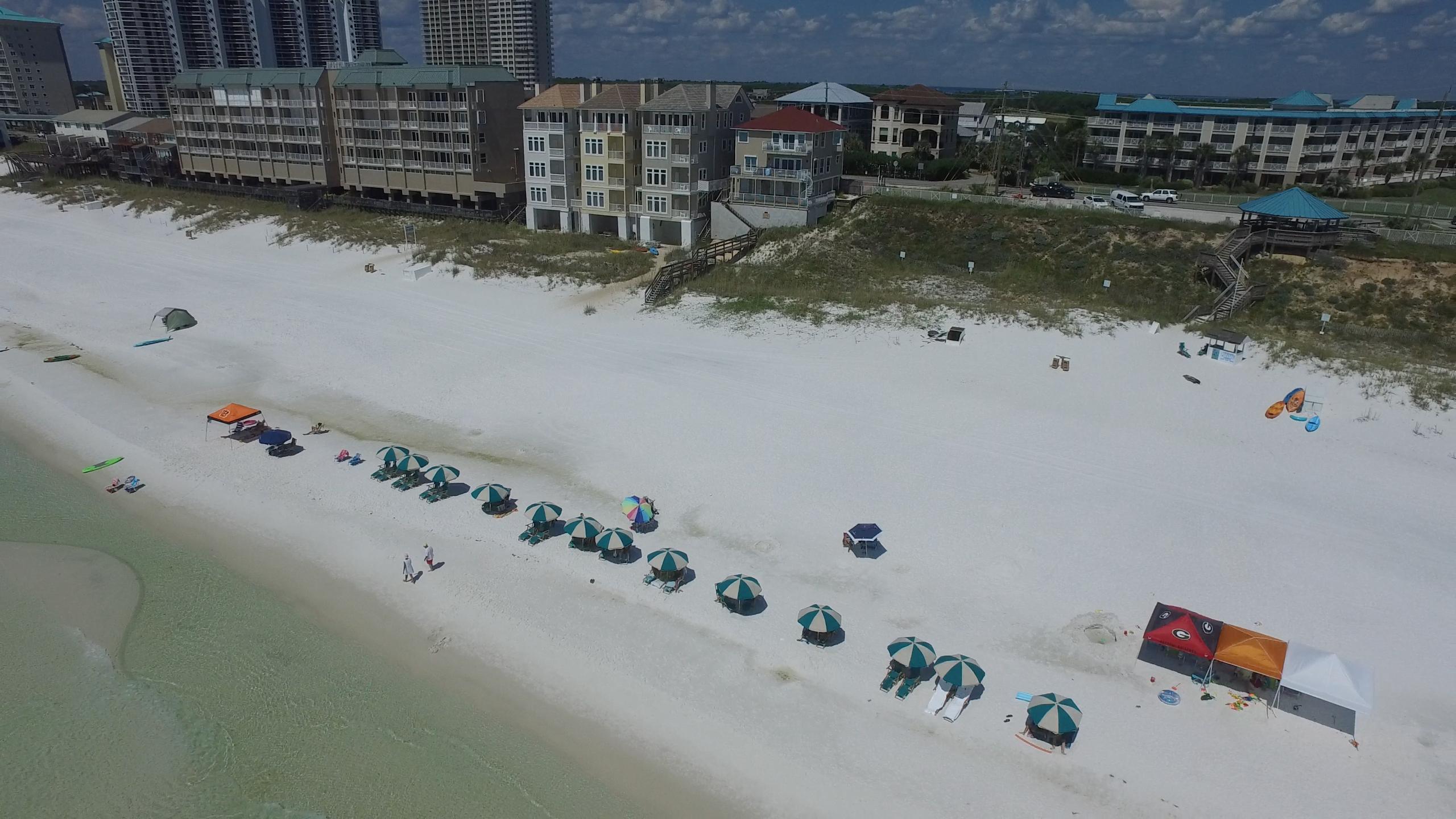 Location is everything!!! This beautiful 5 bedroom 4 bathroom home is available for purchase located close to the new Acme Oyster House in Seascape as well as the Silver Sands Outlets and other gulf front dining restaurants. Sitting atop the sugar white sands over looking the emerald waters of the Gulf of Mexico this spacious vacation rental home is renting for over $120,000.00 a year. You will enjoy endless sunsets and sunrises while building your family memories that will last a lifetime. This coastal home is priced to sell. Please contact me today to schedule your private showing of the fabulous beach front home.