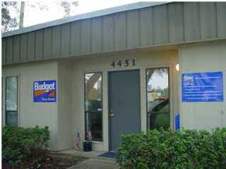 Great building with small dry storage in back of the building. Fenced in area for trucks and equipment. Good highway frontage for any business. Building consists of small reception area and 2 separate offices with 2 bathrooms.