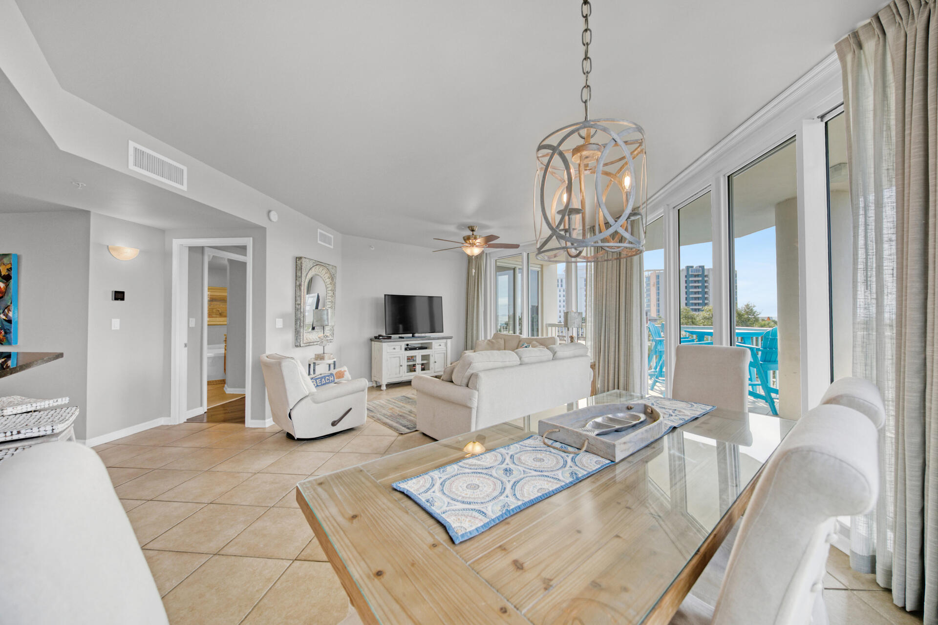 **ACCEPTING BACK-UP CASH OFFERS**Ideal location, stunning views, and professionally decorated- this turn-key income producing property has it all! Celebrate the new year with this newly updated luxury property in the heart of Destin, Florida! This property sleeps 8 people, has over 107 positive reviews, and currently has $70,000 of income on the books for 2022. Reviews are transferable to the new owner. The 1,804 square foot end unit has been professionally refurnished and updated with floor to ceiling paint, blackout curtains, new light fixtures throughout, and new coastal furniture including two new temper-pedic king size mattresses. You'll also find beautiful artwork throughout the unit created by local artists. Step into sunshine with floor to ceiling windows across the living room the emerald coast waters. The open floor plan allows for entertaining or relaxing with family, and you'll love the ceramic tile flooring throughout for easy cleanup after a fun day on the beach.
The kitchen boasts stainless steel appliances, granite countertops, and plenty of cabinet space along with a breakfast bar that seats 4. Located across from the kitchen you'll be pleasantly surprised to find a laundry room with washer, dryer, and oversized sink with additional pantry space.
Enjoy a morning brunch or stunning sunsets while relaxing on the new patio furniture on either of the large balconies; or stay indoors and enjoy the almost panoramic Gulf of Mexico views from the living room, dining room, kitchen, or either of the master bedrooms.
The spacious master bedroom has plenty of space for its king size bed and has a walk-in closet attached to the spa-like bathroom with jacuzzi tub, glass shower, and his-and-her vanities with granite counter tops. An equally large second master with king bed and en-suite bathroom has a shower-bath combo. The third bedroom holds a queen bed adjoining a shower bath.
This condo is in the St. Lucia building of the exclusive Silver Shells Resort, an upscale 31-acre gulf front Silver Shells Beach Resort and Spa in Destin and is conveniently located by the Candy Shoppe, Back Porch restaurant and Henderson Beach State Park. This sought-after location is just minutes away from Big Kahuna Water Park, The Track Recreation center, Destin Commons with its great shopping and theaters, the Destin Airport, Walmart, Silver Sands Outlet Mall, Harbor's Famous Charter Fishing Fleet, and Championship Golf Courses.
Guests also have complete access to the Destin Health and Fitness Club 1.3 miles away. The Destin Health & Fitness Club is a state-of-the-art, 13,000-square-foot exercise facility with cardio equipment including StairMasters, bikes, treadmills, and ellipticals, a juice bar, day care facility, group fitness classes, spin classes, and weight training, including free weights, weight machines and resistance training.
The St. Lucia building recently received new paint and carpet in the public areas and offers a private pool and hot tub. Gas grills with semi-private picnic tables and chairs are located right outside the building for your use and designated covered parking spot for one vehicle is located in the below-ground, gated parking garage next to the elevator. Parking for additional vehicles is available on the Lobby Level. All dimensions to be verified by the buyer.