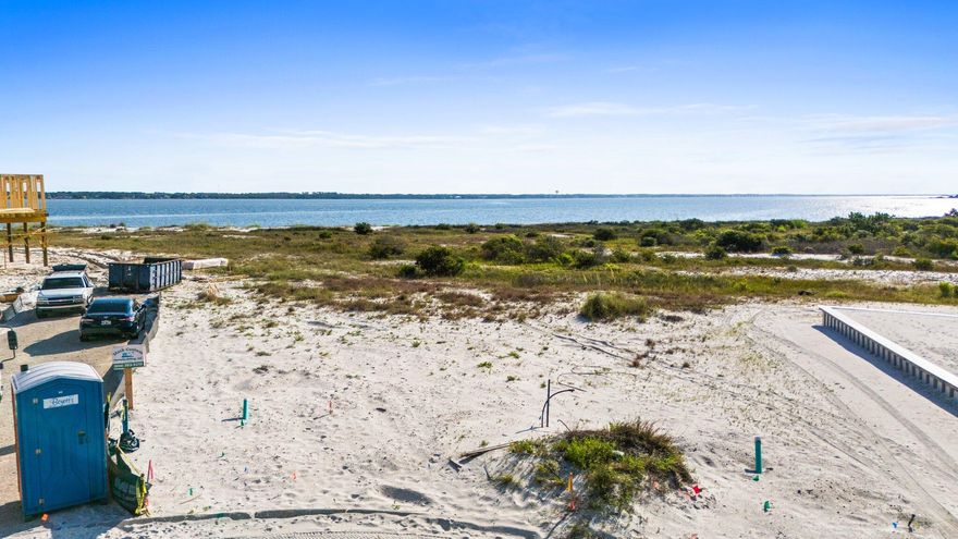Vacant residential lot with white sand water view, ready for your new build! Deeded beach access in the exclusive coastal subdivision of By The Sea. Close to the Sound and the Gulf with fabulous views of each! Community has 458 ft of shoreline along Santa Rosa Sound and is located between 80 acres of Santa Rosa County Park land and 8 miles of undeveloped federally protected Gulf Islands National Seashore. By the Sea residences architecturally restricted with design in the style of Seaside and Rosemary Beach in Destin. Sea turtle friendly lighting, brick pavers, underground utilities, community pool, bathhouse, outdoor hot tub, fire pit grill and picnic areas, deeded beach access and community park access.