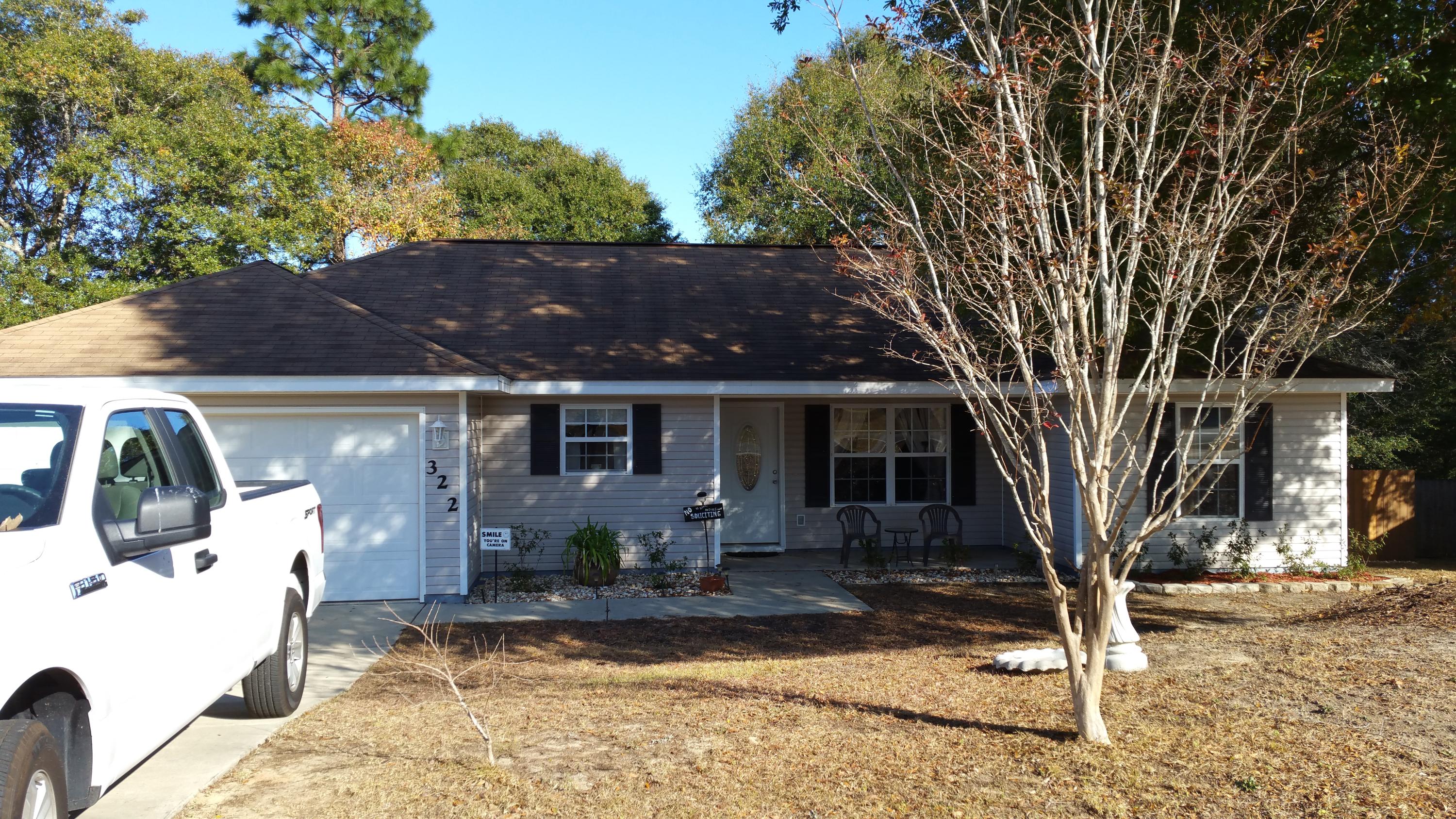 Move-in ready in a great location on a quite street. This home is located near schools, town, and military bases. It's a 3 bedroom, 2 bath with a 2 car garage, and fenced in backyard. The home includes hurricane shutters, all appliances including front load washer and dryer, and the owner is offering a home warranty with purchase. This home won't last long so don't miss the opportunity to call this place home.