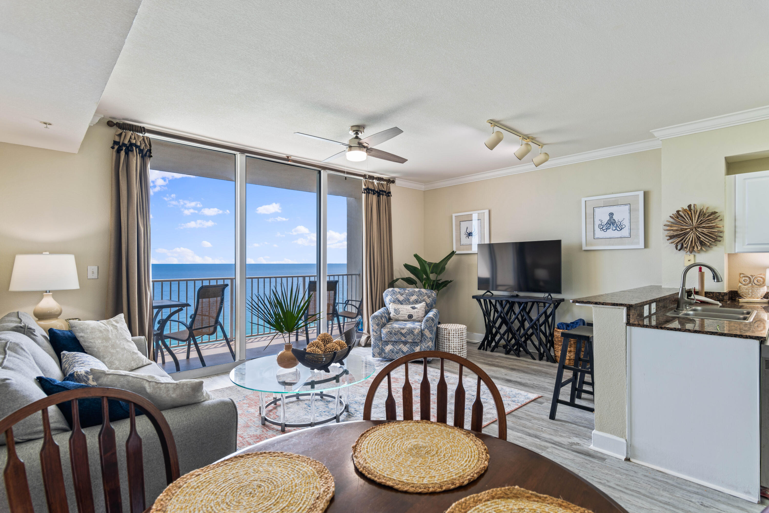 Located at Tidewater Beach Resort, just a 1/2 mile from Pier Park, this recently updated beautiful 2 bed, 3 bath unit is move-in ready and being sold furnished! With the additional bunk space and third bathroom, the unit sleeps like a 3 bedroom. Enjoy Updates and renovations include a new air conditioner (JAN 2021), new LVP flooring throughout, freshly painted interior, new living room sofa, new full size washer and dryer, and new dishwasher. Enjoy the coastal decor and the view from the floor to ceiling sliding glass doors that open up to your private balcony, on which you can enjoy beautiful sunrises and sunsets overlooking the Gulf of Mexico, with its emerald green waters and white sandy dunes. Guests may easily arrive by car or air, due to the close proximity of the NW Florida Beaches