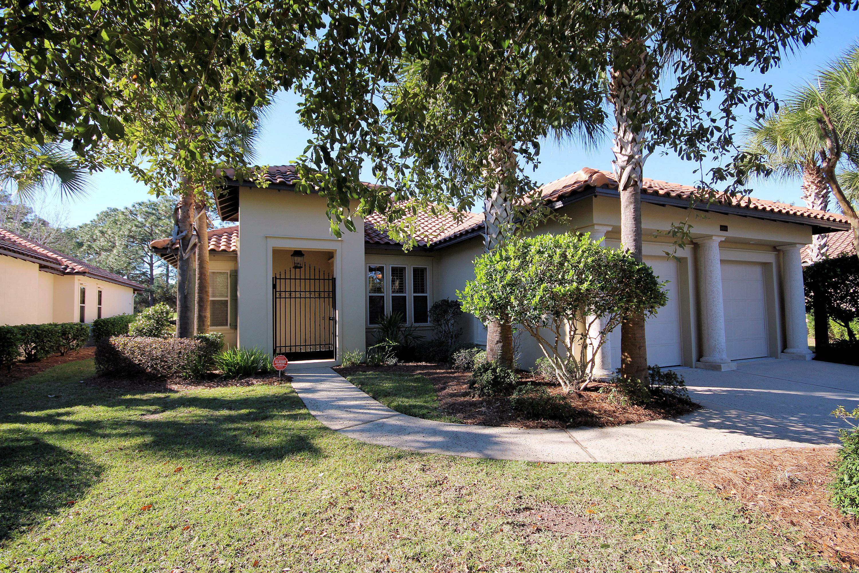 This old world style villa overlooking the 7th Fairway of Sandestin's Raven Golf Course is a must see! Nestled on the intimate single street enclave of The Vineyards, this home derives instant appeal from its harmonious architectural exterior and established landscaping. Located near the end of the street, you will enjoy the privacy and serenity of this 1-story, 3 bedroom, 3 bath home. This open concept floor plan is great for entertaining and opens up to a large screened porch with great views of the golf course. Built in 2004, this home is appointed with stainless steel appliances, granite counter tops, travertine floors, high ceilings, a gas fireplace and 2 car garage. The master suite features a spacious bathroom with double vanities, a jetted garden tub, a large ... separate shower and a large walk-in closet. This charming home is being sold furnished and the golf cart will convey as well. Golf carts are a great way to travel in Sandestin. Run under the tunnel at 98 and you are at the beach, over to the Village of Baytowne Wharf to eat and shop and to Grand Boulevard with all of its shops and restaurants -- they are all golf cart accessible. The owner has maintained the home very well and it is in immaculate condition. The Vineyards does not allow short term rentals, and is a great neighborhood if you are looking for a permanent or second home. Homeowners in The Vineyards enjoy access to Sandestin's three HOA managed pools on the resort. Buyer to verify all room dimensions, lot size and assessment fees.