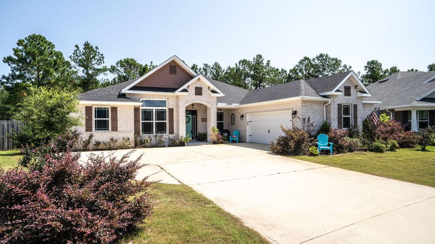 Stunning 3489 SF home with soaring 12' ceilings in Brighton  of Hammock Bay!  This 5BR/3BA home has separate dining room, enclosed office, flex room, engineered wood flooring with carpet in bedrooms.   In the spacious gourmet kitchen you'll find stainless appliances, large island with double stainless sink, walk-in pantry, butler's pantry/coffee bar, and a gas range/ oven which will make for a very happy chef! Wonderful master suite has entry foyer and a bath with separate shower/garden tub, dual vanities and a large walk-in closet and two linen closets. Open floor plan flows very well, with kitchen/ breakfast/living area adjoining a wide covered porch and a fenced yard. The home backs up to a lovely preserve area.