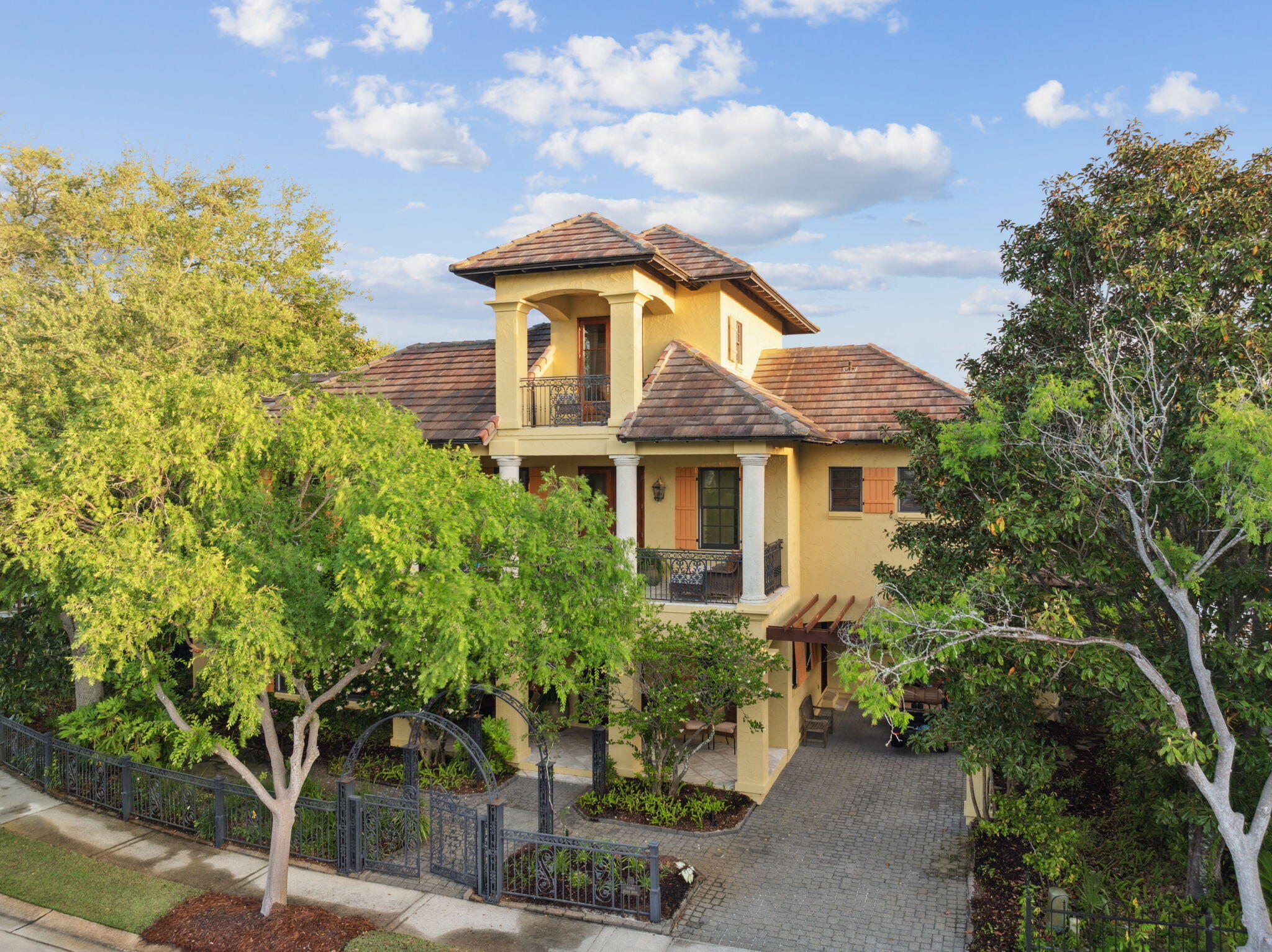 Welcome to ''Sugar's Beach House'' a four/3.5 bath with bunk room and four covered porches in the gated beach front Neighborhood of Caribe. This beautiful home nestled in a picturesque setting designed by Dennis Chavez reflects the colorful tradition of Caribbean Style. Outdoor living abounds as deep wide verandas on two levels plus a side porch overlook gardens, a series of custom eye pleasing iron work arches and an iconic fountain. The fountain is a one of Caribe's coveted focal points. Gazing from the living area or porch in the late afternoon the private garden's lush green plants and the sparkling fountain are perfectly framed reflecting restful hues and shades of twilight with the promise of an evening to remember. The combination of dining, living and sitting room are filled with nostalgia for a period gone by when life's pace slowed and beckoned relaxation. The rustic kitchen is reminiscent of a French villa on the Mediterranean. The second floor with wood floors, tall ceilings and a large veranda features the Primary Bedroom with large walk-in closet, two guest bedrooms and a bunk room. A series of windows and a set of French doors allow light to flood the hallway as you approach the Primary Suite. The third level bedroom with private balcony overlooks the captivating streetscape of Caribe's Place de la Fontaine. Caribbean Style details include deep inviting porches with colonnade, French Doors, wrought iron work throughout, plantation shutters, and tall ceilings.
Caribe is a picturesque beach neighborhood tucked away on an uncrowded stretch of beach. Caribe is always beautiful, never crowded because rentals are limited to 8 occupancy. Owners enjoy tennis and pickleball courts, two pools with bath houses, lake pavilion, two beach walkovers and private, gated entry with soft evening lighting and beautiful streetscape. Live and play minutes from the area's finest golfing, tennis, dining and shopping. Explore nearby Silver Sands Premium Designer Outlet, Grand Boulevard, Market Shops at Sandestin and AMC Classic Boulevard 10. On Saturday mornings after a walk on the beach, head to the Farmer's Market at Grand Boulevard for fresh fruits, vegetables and local honey, or breakfast at the Market Shops at Sandestin. We invite you to make an appointment today to discover 30 Place De La Fontaine located in Rue Caribe.