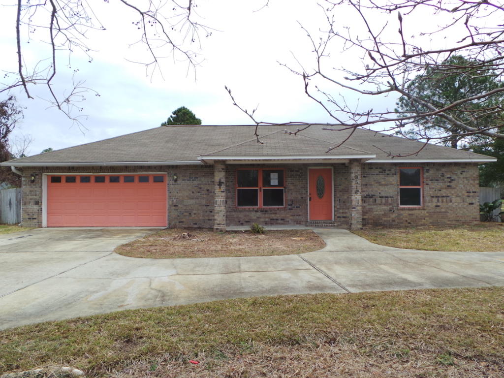 Lovely Home In Gulf Breeze! This home features three bedrooms two full bathrooms and over 1400sqft of split floor plan. Interior is open and inviting with plant ledges, vaulted ceilings and open to the kitchen/dining area. Kitchen has more than ample work space, storage and some appliances. Master bedroom boasts a trey ceiling and bath that has double vanity and shower/tub combo. From the living/dining area is access to the screened porch, where you can look out into the backyard that is privacy fenced.