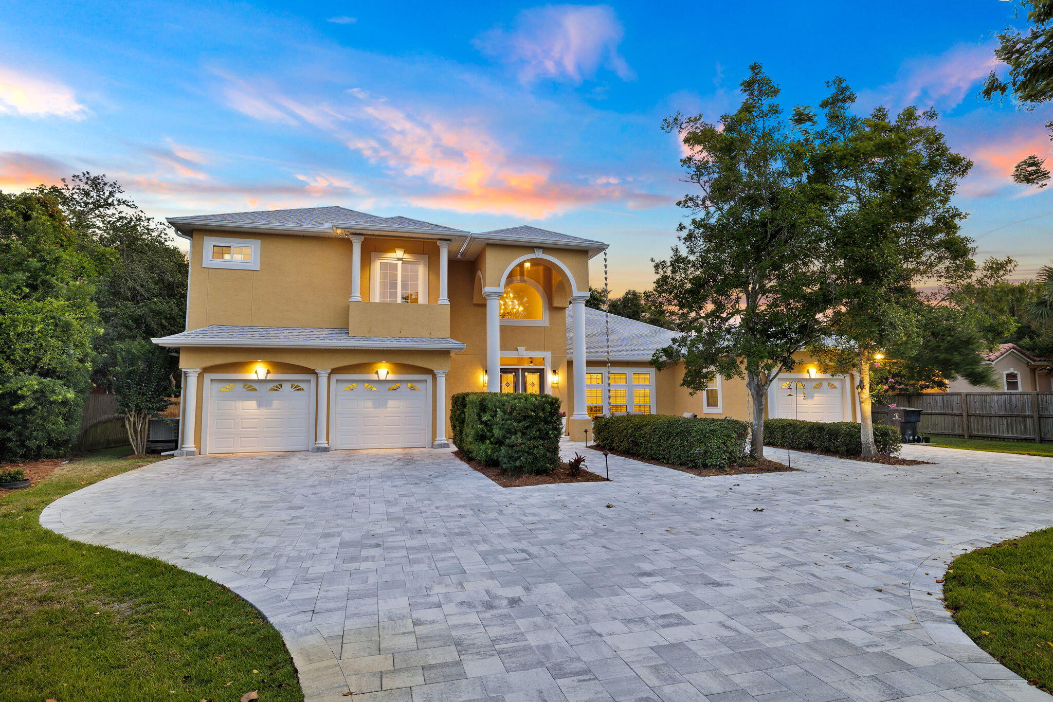 Nestled on nearly an acre of beautifully landscaped grounds, this stately home overlooks the shimmering waters of Grand Lagoon, offering unparalleled waterfront living just minutes from Gulf access. This custom-built, one-owner home boasts a desirable and spacious 4-bedroom, 3-and-one-half bathroom floor plan, thoughtfully designed with modern updates and conveniences. With 100 feet of pristine water frontage, this boater's paradise presents endless possibilities for customization. Extend your private dock further, up to 20 feet, into the lagoon and design your ultimate boat storage accommodations. Don't miss the opportunity to own this rare gem where luxury meets the coastal lifestyle. Schedule your private tour today!
