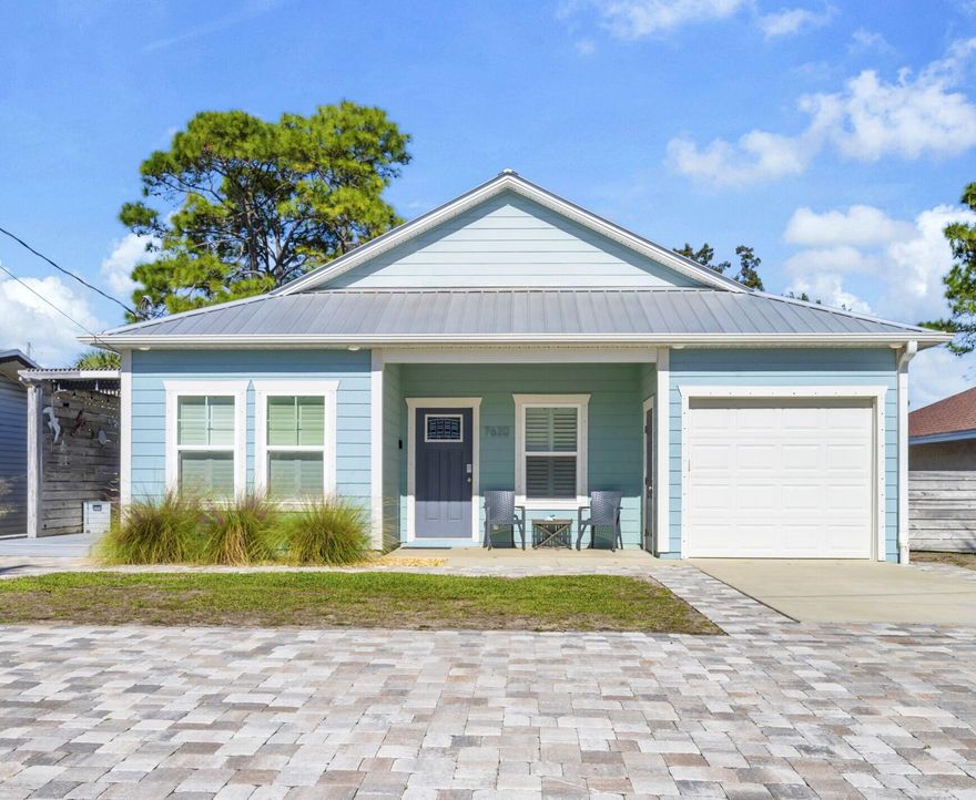 This absolutely charming beach home is fully furnished--just bring your suitcase. Its spacious, open floor plan integrates the modern kitchen, airy living room, and inviting dining area.  Built in 2019, this home shows off two serene bedrooms, two bathrooms, and a charming bunk room.  Features like a metal roof, single-car garage, plantation shutters, sprinkler system, and so much more complete the package. Enjoy the outdoor, covered patio for beautiful Florida evenings and a refreshing outdoor shower after your short walk from the beach.