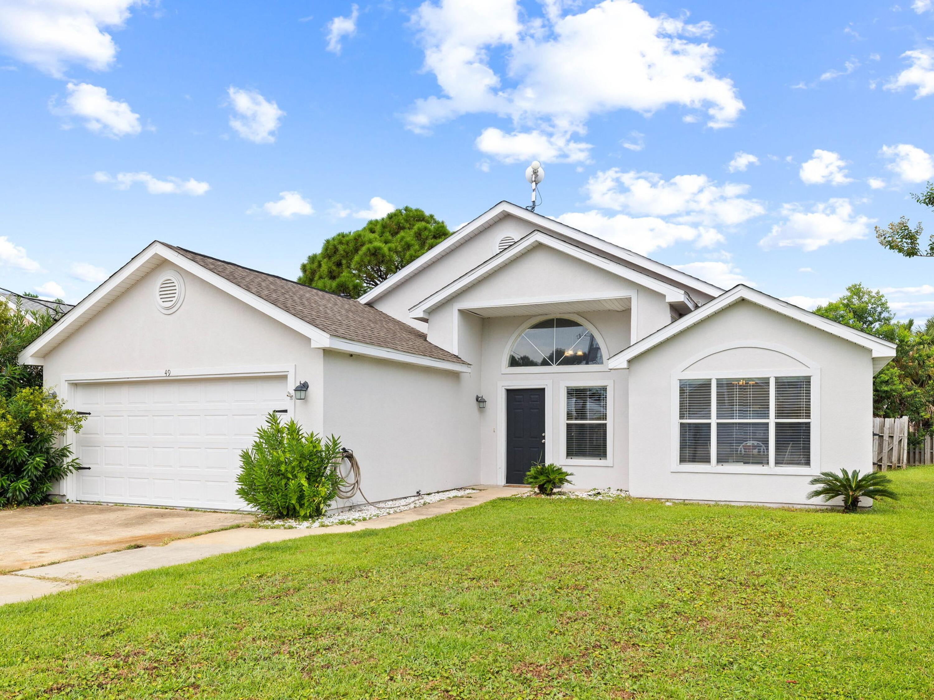 Welcome to the perfect Florida home! This modern and spacious home offers everything you need for a beach lifestyle. From the open living area featuring cathedral ceilings, luxury vinyl flooring, and sliding glass doors that lead out onto your covered and screened patio - this home is sure to impress! The kitchen features granite countertops with glass backsplash, stainless steel appliances, plenty of countertop space, and a convenient eat-in area. The split bedroom floor plan ensures privacy in each room. Finally, the master bedroom includes a beautiful ensuite bathroom complete with garden tub, walk-in shower, and double vanity - perfect for relaxation after long days in the sun. Don't miss out on this amazing opportunity to experience Florida living at its finest!