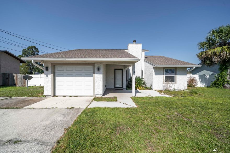VA assumable loan 5.375% interest.COMPLETELY REMODELED HOME. Stunning 3-Bedroom Home in Prime Panama City Beach Location Welcome to your dream home in one of Panama City Beach's most sought-after private communities! This beautifully updated 3-bedroom, 2-bathroom home offers over 1,500 sq. ft. of thoughtfully designed living space, making it the perfect retreat for relaxation or entertainment. Ideally situated near Pier Park, top-rated Bay County schools, world-class shopping and dining, and, of course, the breathtaking white sandy beaches, this home delivers both luxury and convenience. From the moment you arrive, the freshly painted exterior and beautifully landscaped yard set the tone for the quality and care that defines this property. Step inside to discover brand-new porcelain tile flooring throughout, elegant, canned lighting in the great room and master bedroom, and a spacious Florida room with brand-new windows, fully heated and cooled for year-round comfort. The great room is truly a showstopper, featuring raised ceilings, a stunning shiplap accent wall, and a wood-burning fireplace, creating a warm yet sophisticated ambiance. The sleek, upgraded kitchen is a chef's delight, complete with new stainless-steel appliances, granite countertops, a stylish tiled backsplash, and a generous pantry. The master suite offers an incredible retreat with ample space, a huge walk-in closet, and an en-suite bathroom featuring a tiled tub/shower. The additional bedrooms, located on the opposite side of the home for privacy, provide spacious closets and versatile space for family or guests. The second bathroom has been tastefully updated with modern tile flooring and a tiled shower. Designed for effortless living, the laundry room flows seamlessly into the garage, adding to the home's practical charm. Outside, the private, fully fenced backyard is perfect for hosting gatherings, summer BBQs, or simply unwinding in your personal oasis. Additional upgrades include: ... New roof ... New AC unit (installed within the last 2 years) ... New water heater (installed within the last 2 years) ... New exterior paint ... Vinyl Privacy Fence This home is truly move-in ready and a must-see! Don't miss your opportunity to own this incredible property in one of Panama City Beach's most desirable locations. Call today to schedule your private showing!