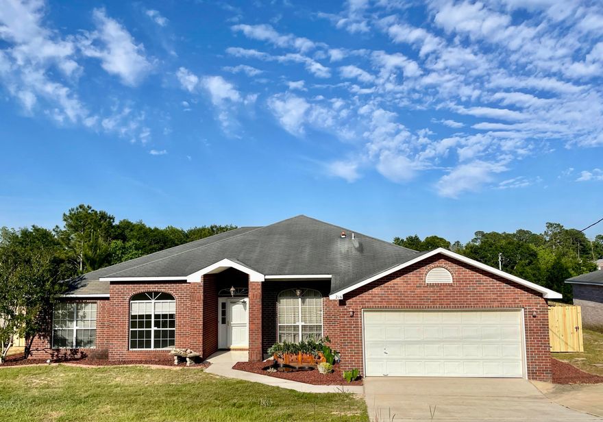NEW ROOF TO BE INSTALLED PRIOR TO CLOSING! Beautiful home with 4 bedrooms and 3 full bathrooms conveniently located South of I-10! This home features a split floor plan, all brick home, freshly painted, new toilets, open floor plan  and more. As you enter, to the left you find the office that sits behind beautiful french doors off the foyer (could be a great exercise room or playroom) and to the right is the formal dining room. The spacious great room has french doors leading out to the back porch. Kitchen has lots of cabinets, a convenient island as well as a breakfast nook w/bay windows. Master bedroom has private doors leading out to the back porch and the master bathrooms offers double sinks, separate shower, two large his and hers walk in closets and a oversized garden tub.