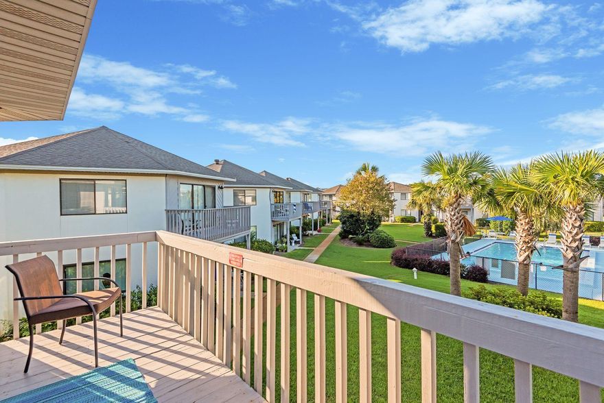 MULTIPLE OFFERS - Highest & Best offers due by 11:00AM CST August 5, 2022. Furnished and rental-ready, this modern condo is the closest unit to the beach at Crystal Village. It is in excellent condition and highly suitable as a vacation rental or second home. Located on the second floor, it enjoys pleasant views overlooking the pool and landscaping. Tile floors flow through the main open living area of the unusual octagonal floor plan creating a spacious open ambiance. Recently painted, the interior is well presented with tasteful beach-themed decor and furnishings included in the sale. This cute, turnkey unit has laminate and cultured marble in both bathrooms. The open kitchen has ample space for the dining table along with a breakfast bar for serving cocktails and snacks.  Linger over a leisurely breakfast, then head off for a day of swimming, shelling and sunbathing. Ideal as a vacation home, the condo comfortably sleeps six in two spacious bedrooms with a sleeper sofa in the living room. Step out onto the furnished balcony which has elevated views across the open green space and one of two communal pools. Lounge chairs are arranged poolside for socializing. This Crystal Village condo includes dedicated parking for one car and additional visitor parking nearby. The sugar-white sands of South Walton are just three blocks away with public beach access at Pompano Joe's adjoining the county park.