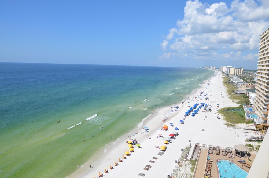 Excellent opportunity to purchase in Treasure Island in Panama City Beach, Florida! The unit is on the highly desirable side of the building and away from the elevators. You also get a view of bay from the front window .With nearly ~1,400 sq.ft. of living space this floor plan offers plenty of room for the whole family to relax and unwind to the sounds of the waves rolling in from the Gulf of Mexico. Endless sunsets present themselves from the 12th floor perch nestled perfectly and sure to appeal to the rental investor or second home owner alike. This property is sold fully furnished and with a well stocked kitchen making this a turn-key rental opportunity that requires very little from a new owner to begin generating revenue. Located near the lagoon so property is great for boaters too.