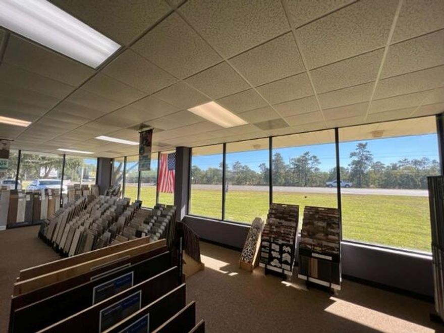 Unique high-profile opportunity! This is the first time this pinnacle location has become available in 20 years! 3,000 SF Retail Showroom with visibility to over 32,000 CPD. Expansive open concept showroom with a solid glass storefront.Fronting HWY 98, next door to former Flea Market and future home of new south Santa Rosa County School. New Developments to be built surrounding property. HWY 98 is the travel corridor between Gulf Breeze and the booming Navarre area. The center is in a determined path of growth and has seen explosive, continued development. This area of HWY 98 has exposure to over 32,500 cars per day.