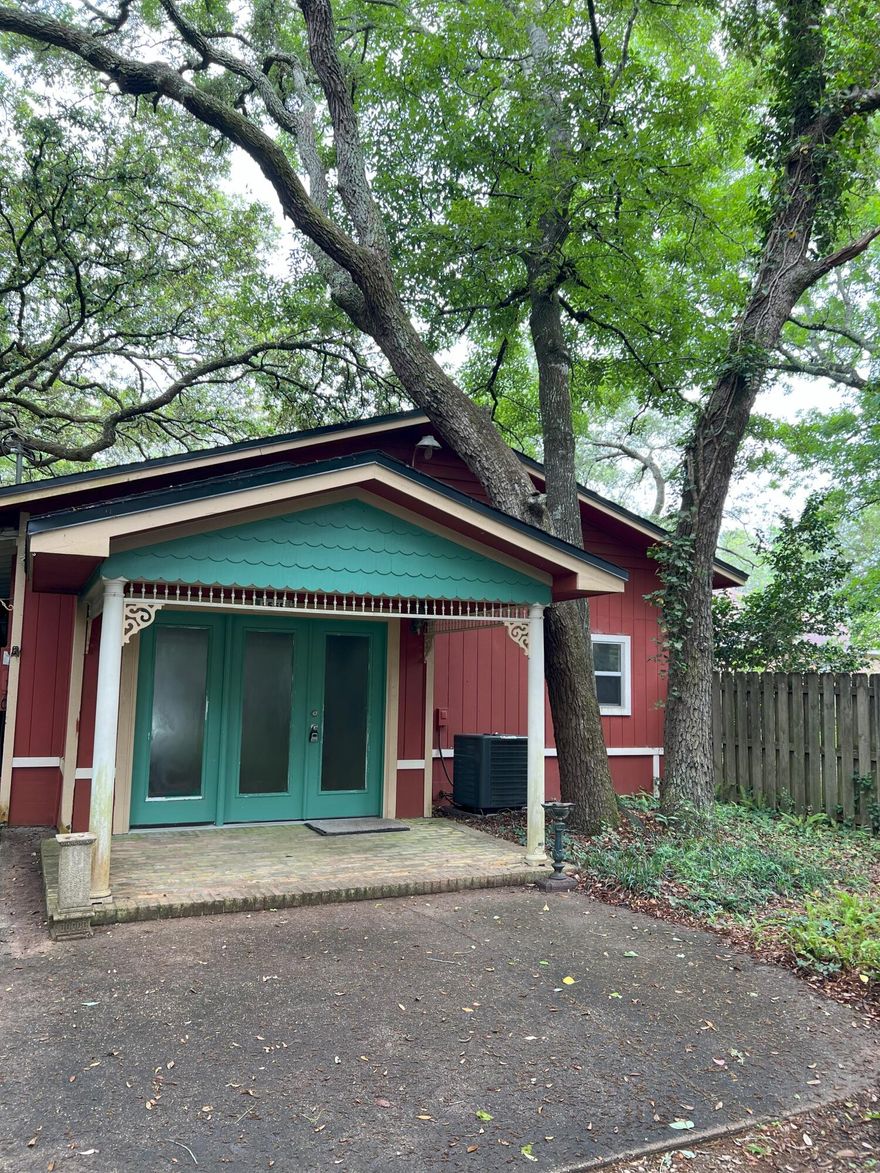 2 bedroom, 1 bath Florida cottage located just minutes from Eglin's East gate. This house is situated on a large lot with lots of stately oaks and a water view. It is approximately 1/2 block from FL Park, and the large privacy fenced yard boasts a large park-quality gazebo. A carport is attached but there is also ample space to park recreational trailers in an additional parking area. A shop is attached off the carport. The large living room with french doors off the kitchen/dining area. An indoor laundry room is off the kitchen. The master bedroom has a pocket door to the bathroom and the second room can be used as an office or 2nd bedroom. Military clause and discounted security deposit with proof of military ID. Immediate occupancy.