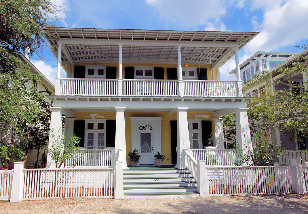This is southern charm at its finest! Designed by Don Copper, this beautiful home is full of charm and has the perfect location. Located by the west-end family pool, there is a direct shot down Natchez Street to the beach. Your first taste of that good ole' southern hospitality hits you as soonas you step foot on the veranda; wide and deep and most welcoming. This shaded spot is the perfect place to start your day or reconvene with family to discuss the day's events. The first floor of this beauty is bright, light, open and airy. The large kitchen with island can accommodate the largest family. Thisspace becomes one with the great room/living room, while the dining room is a magical space unto itself and surrounded by windows.