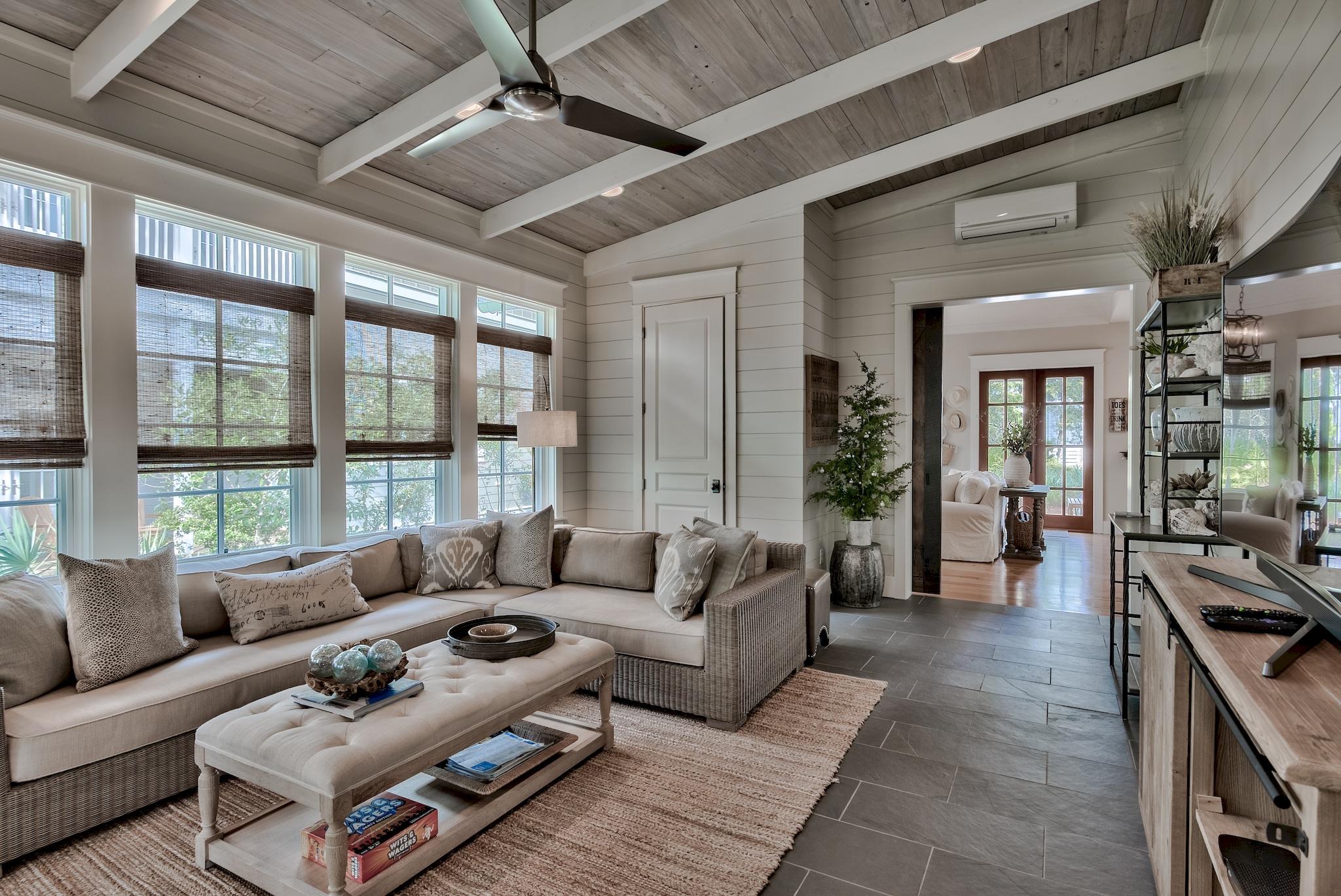 Located in the Hammocks of Seagrove between Watercolor and Seagrove, this 3 bedroom, 4 bath, custom-built home is a must see! From this beautifully updated home, take a short walk to the beach or to restaurants and shopping in Seaside or Seagrove. Return home to the tranquility and privacy of the secluded, gated community. This meticulously maintained home is full of upgrades including wide plank, reclaimed hardwood floors, vaulted ceiling, gourmet kitchen, gas fireplace, extra-large bedrooms, high-end fixtures, stainless steel appliances, and much more. A stunning Florida room with slate floors and beautiful windows was recently added along with a new 1st-floor master bath and additional outdoor space. The Florida room has access to a full bath and could be used as a 4th bedroom.