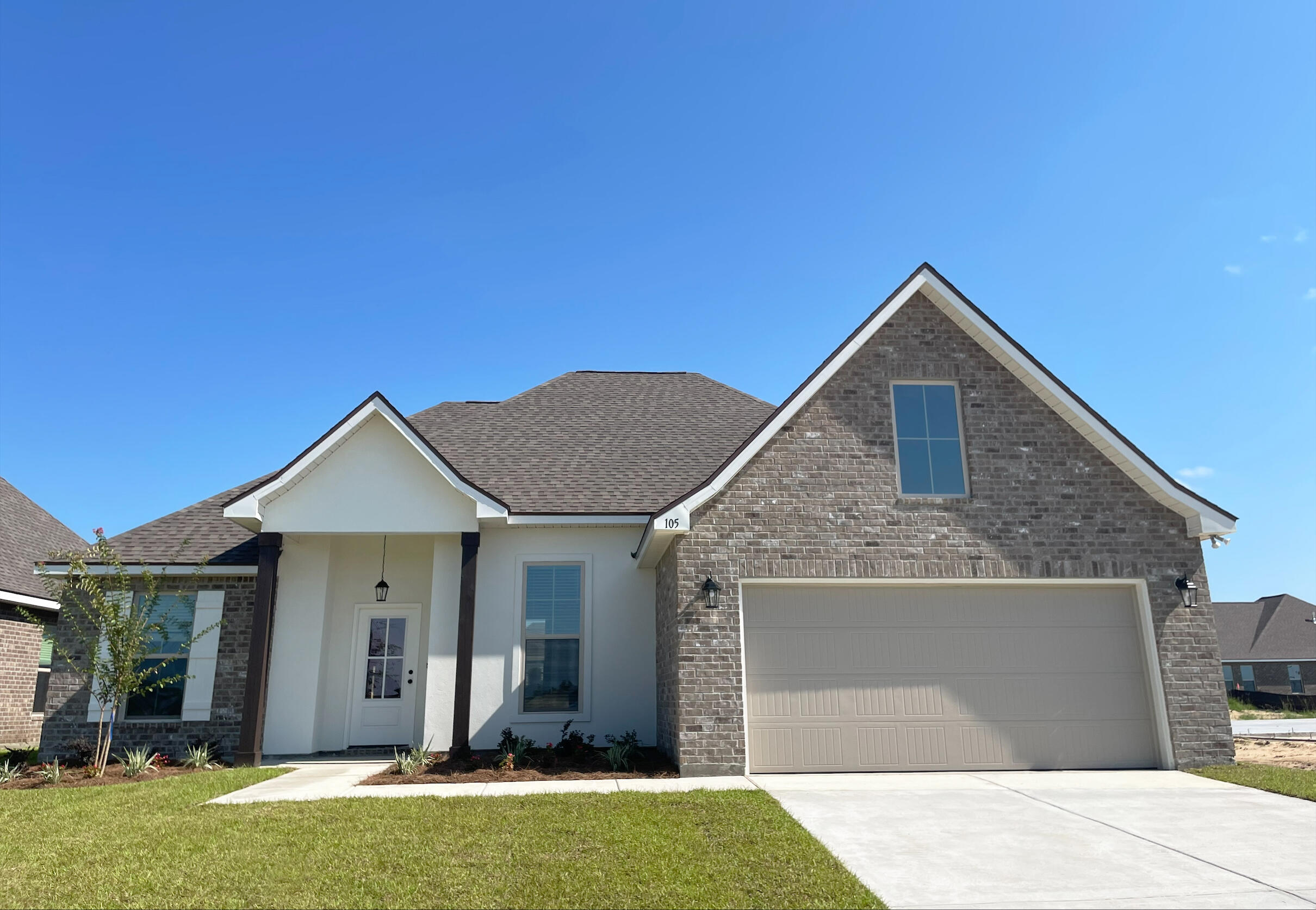 Awesome builder rate incentives and FREE window blinds OR front gutters plus a smart home package (restrictions apply)!The ROSES V B in The Bluffs at Lafayette community offers a 3 bedroom, 2 full bathroom open design with flex space and computer desk/niche. Upgrades added (list attached).Special Features: double vanity, garden tub, separate shower, and 2 walk-in closets in master bath, tray ceiling in master bed, kitchen island, walk-in pantry, covered front and rear porch, recessed lights, crown molding, framed mirrors in bathrooms, undermount sinks, landscaping, architectural 30-year shingles, flood lights, and more!Energy Efficient Features: tankless gas water heater, kitchen appliance package, vinyl low E windows, and more! Energy Star Partner.