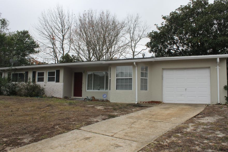 Come see this centrally located move in ready house located on a cul de sac street with a large privacy fenced backyard! Open living area with terrazzo floors throughout.  The kitchen was recently updated with cherry cabinets and counters and stainless steel appliances.  The home features newer vinyl sash windows and updated lighting.  The back yard is privacy fenced and has plenty of space.  Call today for your appointment to view this home.